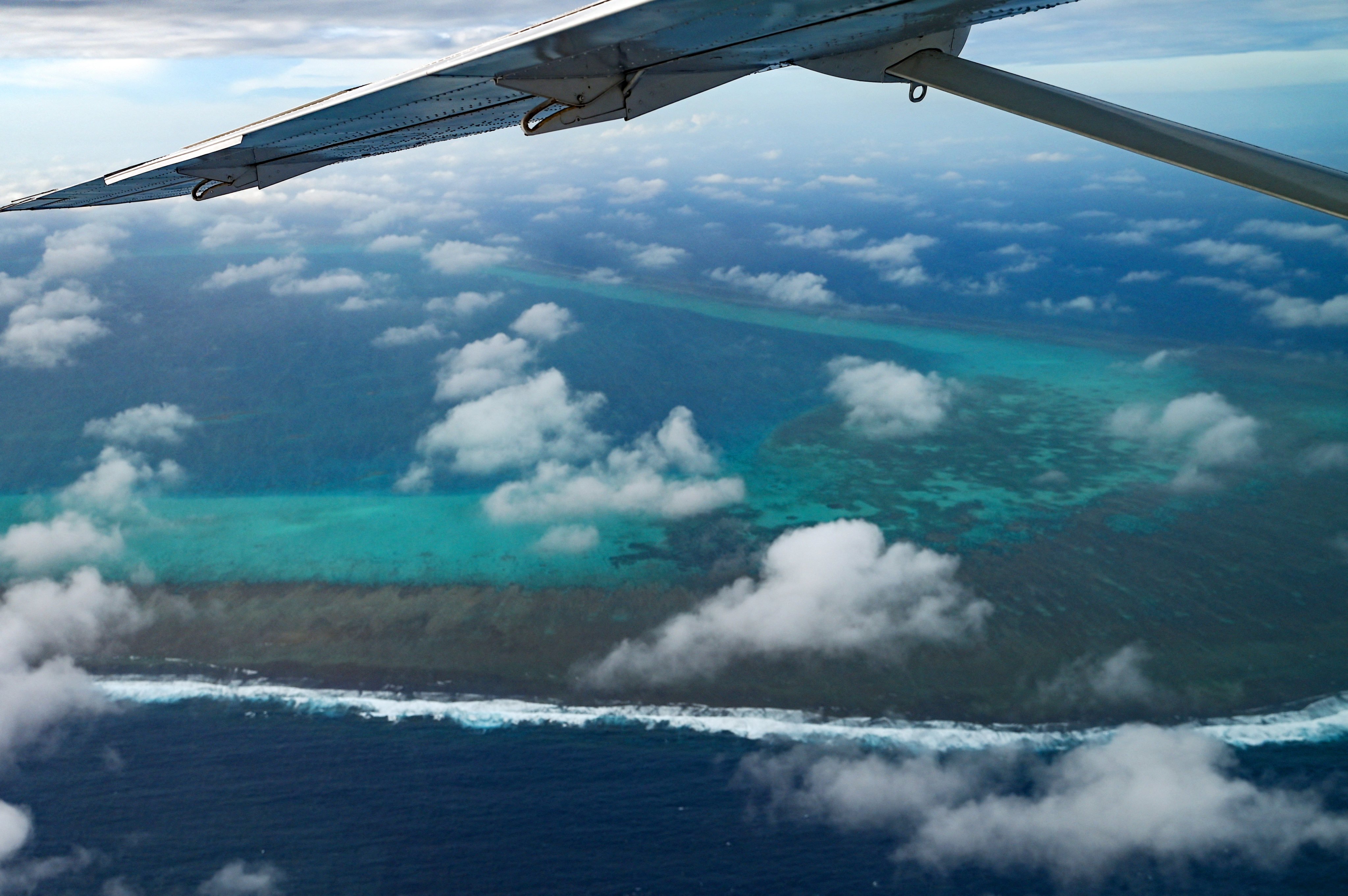 Scarborough Shoal in the South China Sea comes into view during an aerial reconnaissance flight on February 18, 2025. Photo: AFP