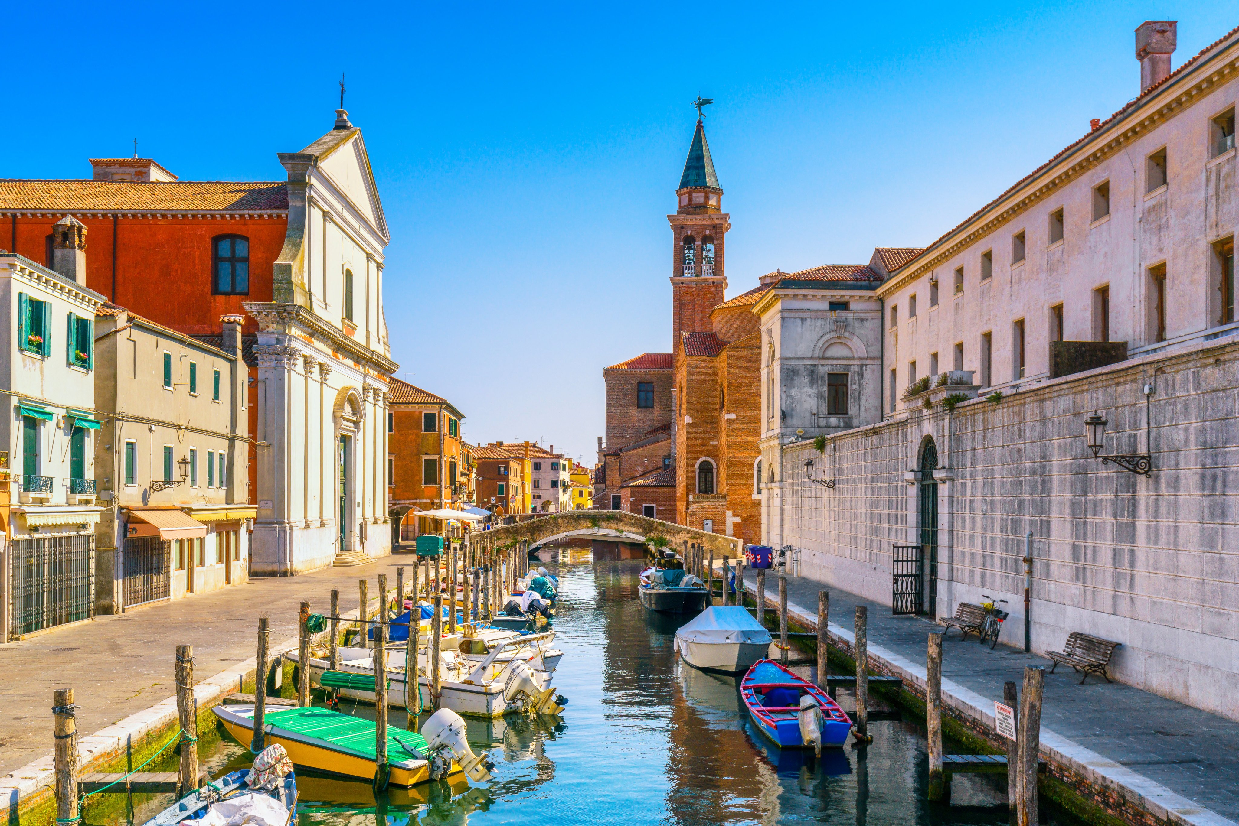 Chioggia town in venetian lagoon, water canal and church. Veneto, Italy, Europe. Photo: Getty Images