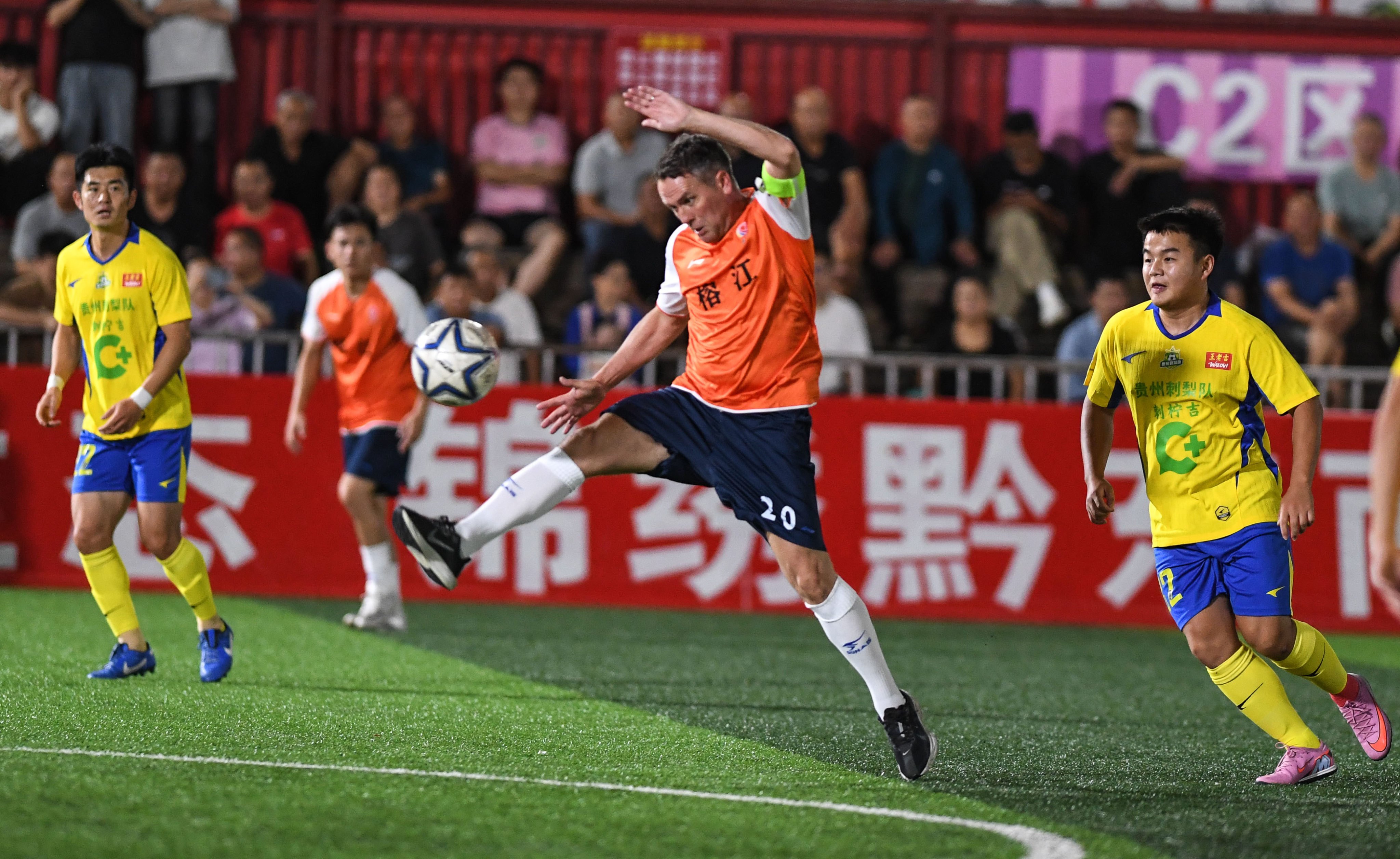 Michael Owen captained Rongjiang Niubi and scored two goals as they lost 4-3 to Guizhou Cili in a friendly match at the Village Super League stadium on Thursday. Photo: Xinhua