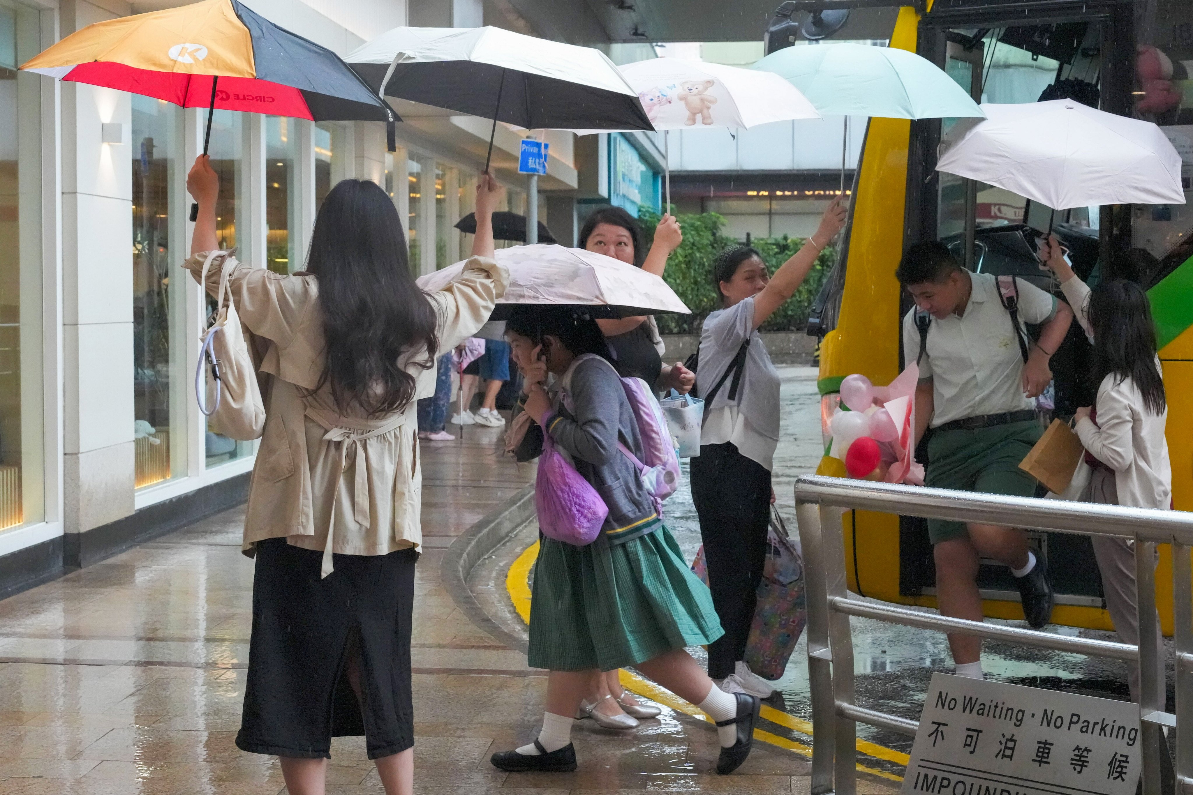 The Hong Kong Observatory has issued a red rainstorm warning as education authorities announced the suspension of afternoon classes. Photo: Dickson Lee