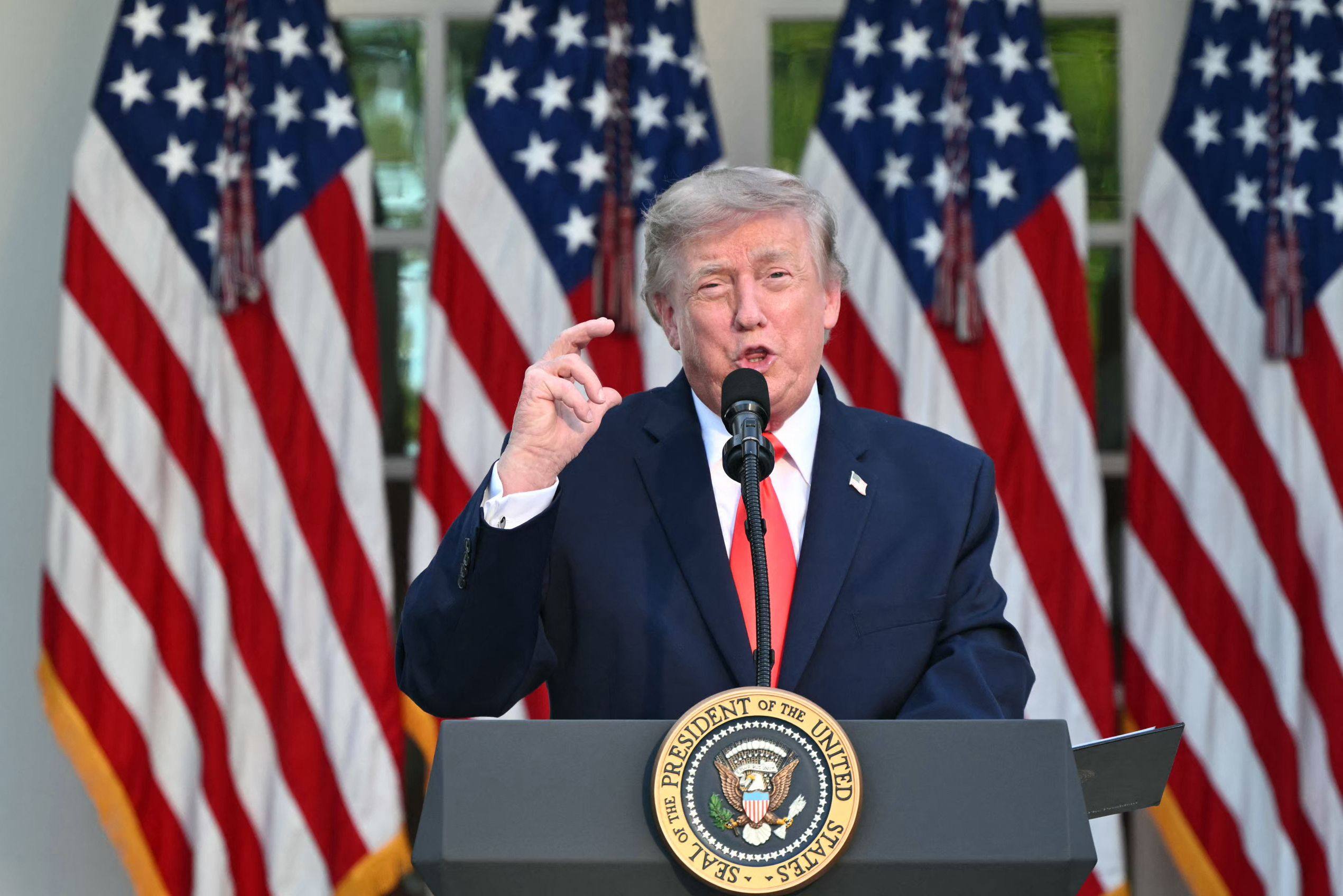 US President Donald Trump speaks during a Rose Garden Club dinner at the White House on Thursday. Photo: AFP