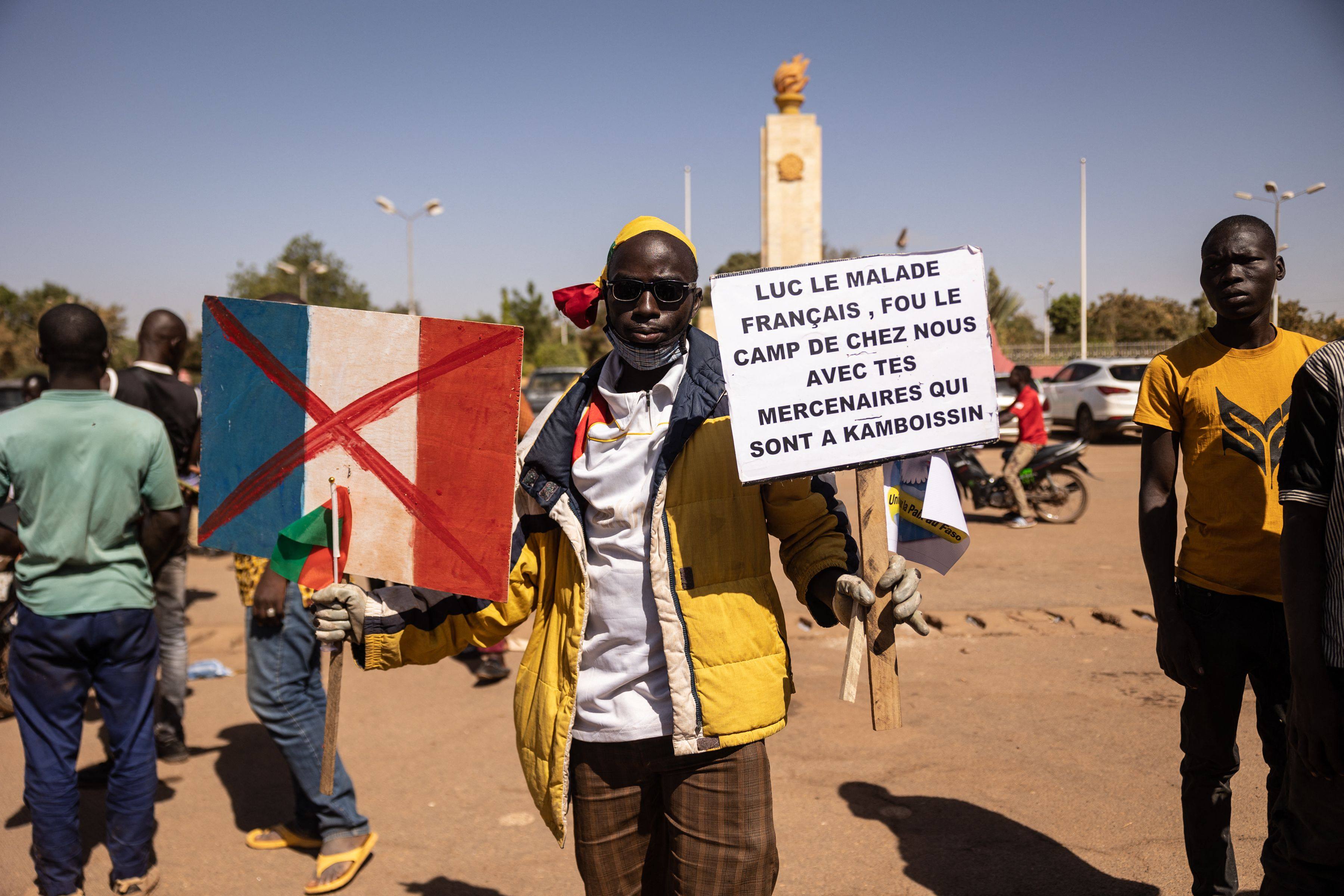 A man holds a placard during a protest to support the Burkina Faso President Captain Ibrahim Traore and to demand the departure of France’s ambassador and military forces, in Ouagadougou in January 2023. Photo: AFP