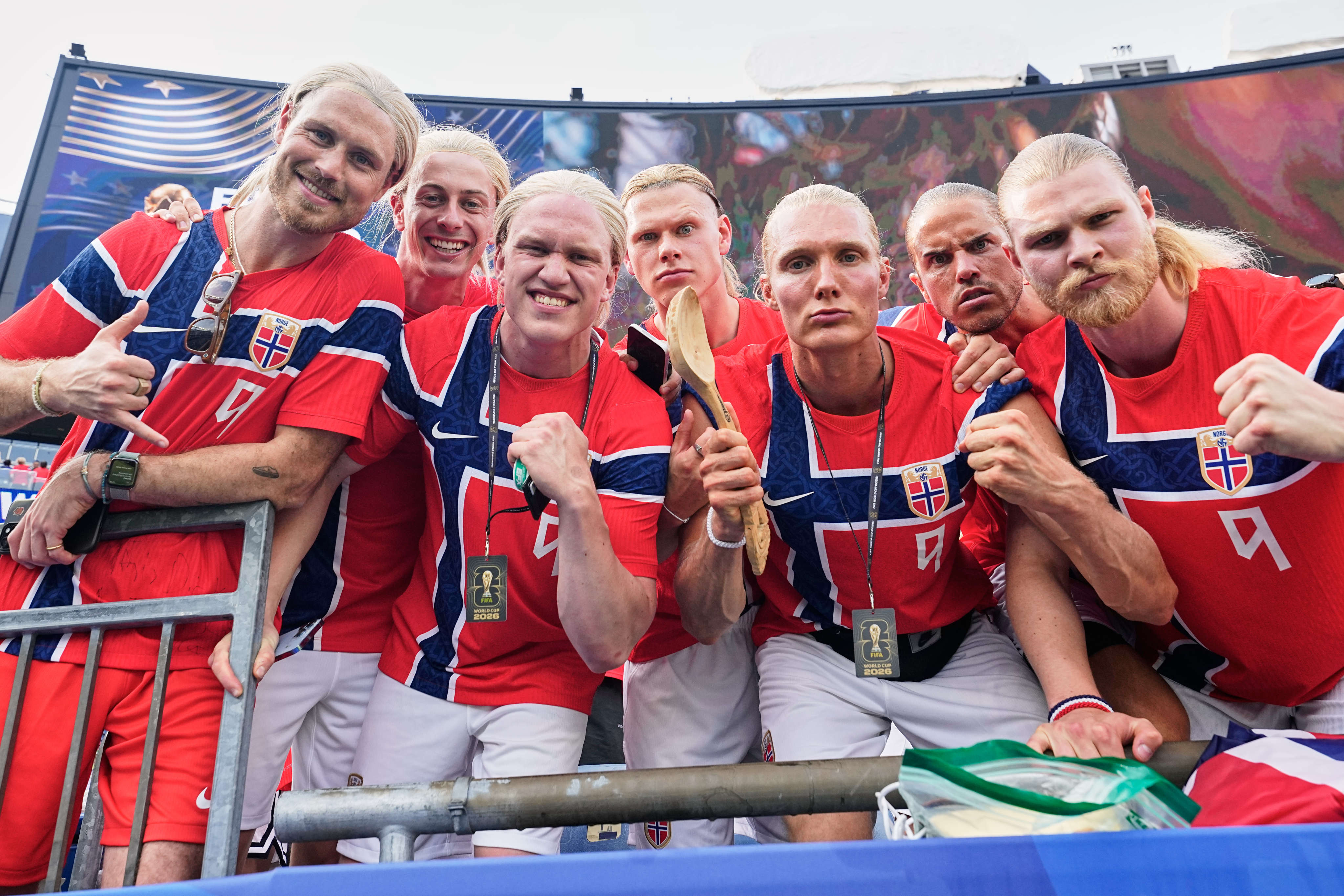 Norway fans dressed up as star striker Erling Haaland pose for a photographer after their side’s World Cup Group I clash with France. Photo: AP