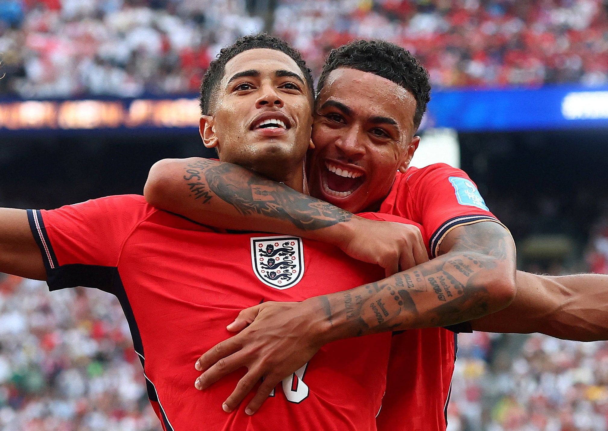 Jude Bellingham gets a hug from Morgan Rogers after scoring England’s first against Panama. Photo: Reuters