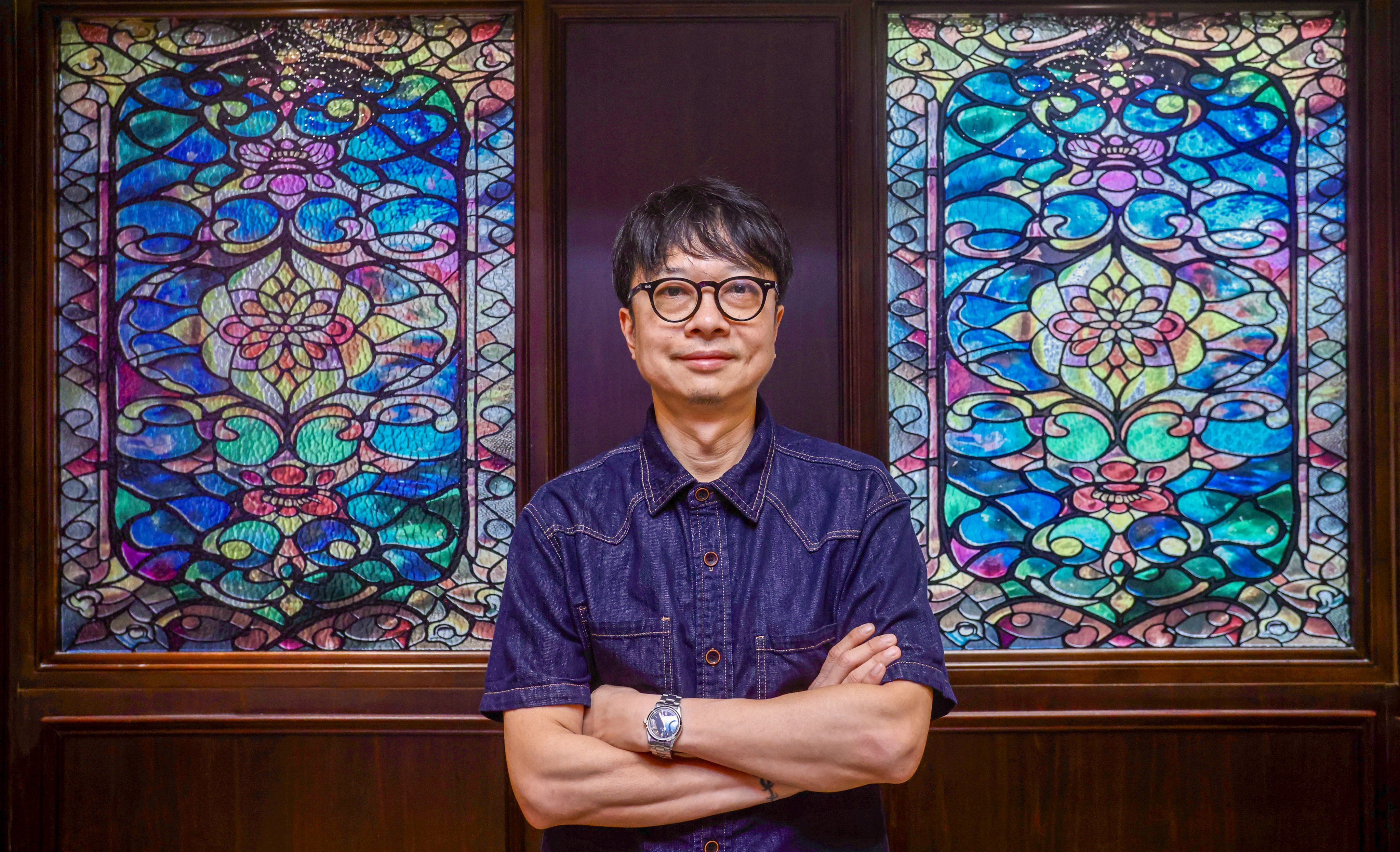 Wong Chi-yin, the restaurant’s design and marketing director, says the decision to buy an LED TV was not originally motivated by the World Cup. Photo: Jonathan Wong