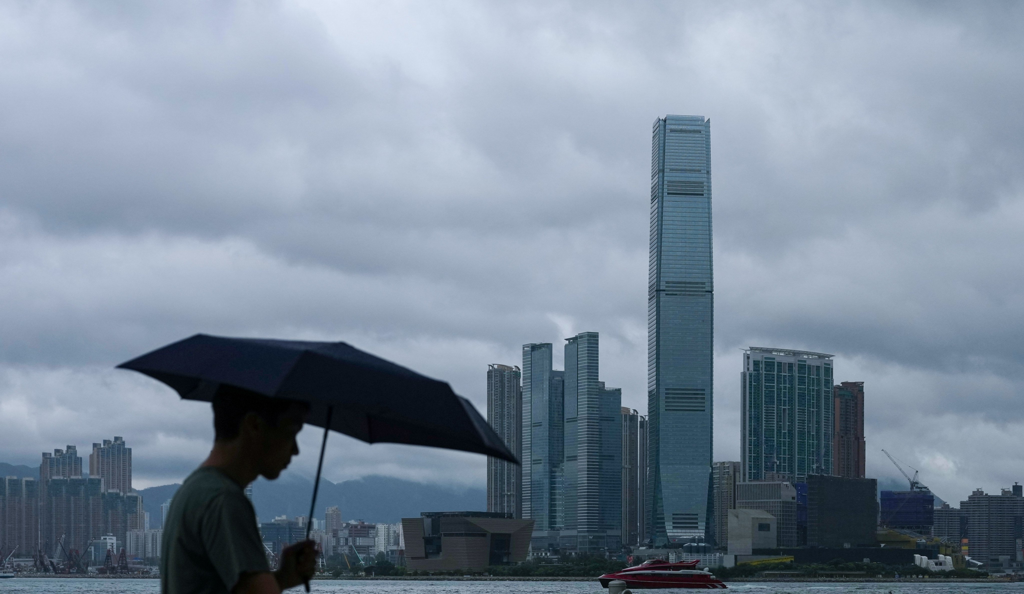 Dark clouds hang over the Hong Kong skyline. Photo: Karma Lo