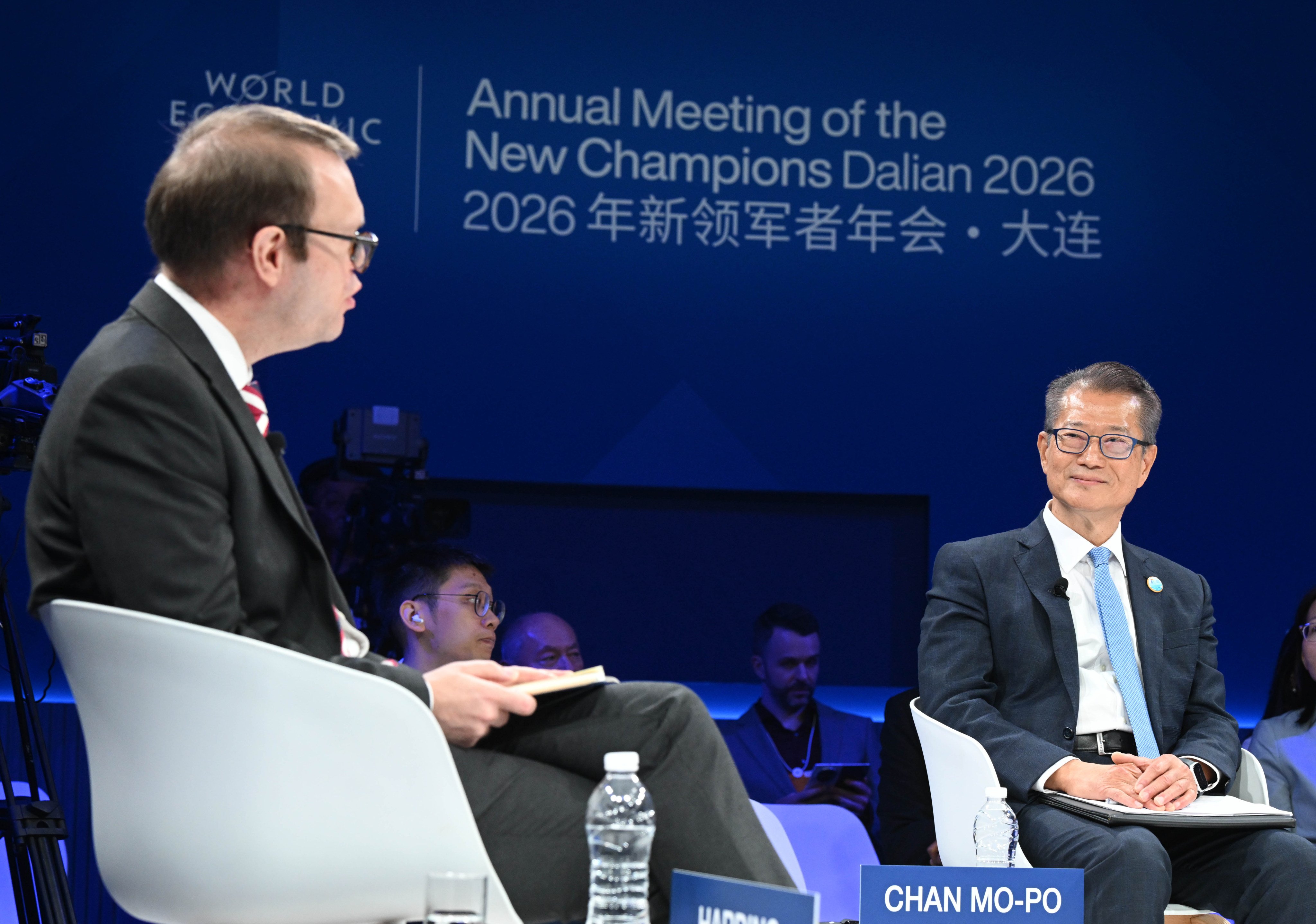 Paul Chan (right) attends the World Economic Forum’s Annual Meeting of the New Champions in Dalian on Wednesday. Photo: Handout