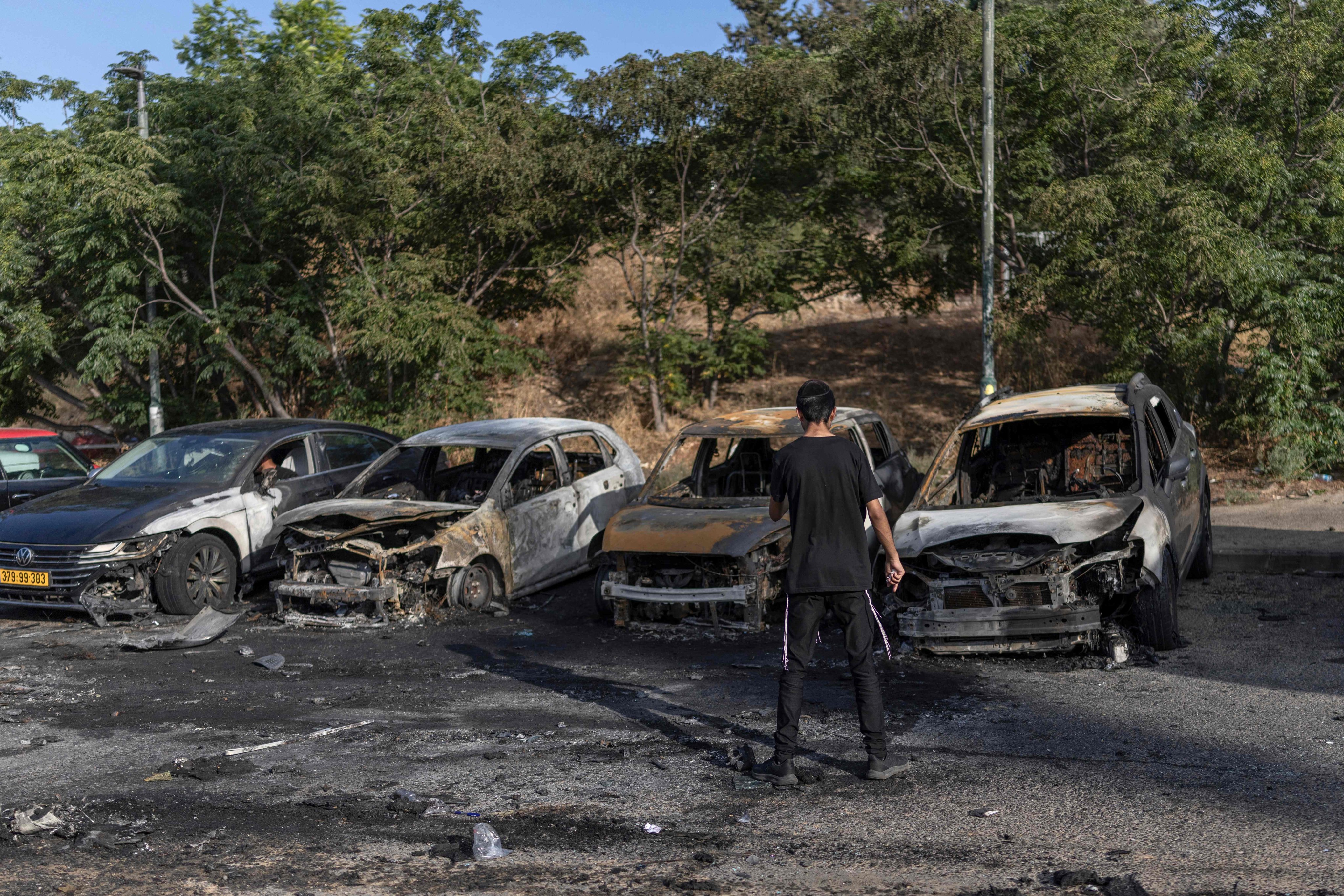 The site of a car explosion in Holon on the outskirts of Tel Aviv on Sunday. Photo: AFP
