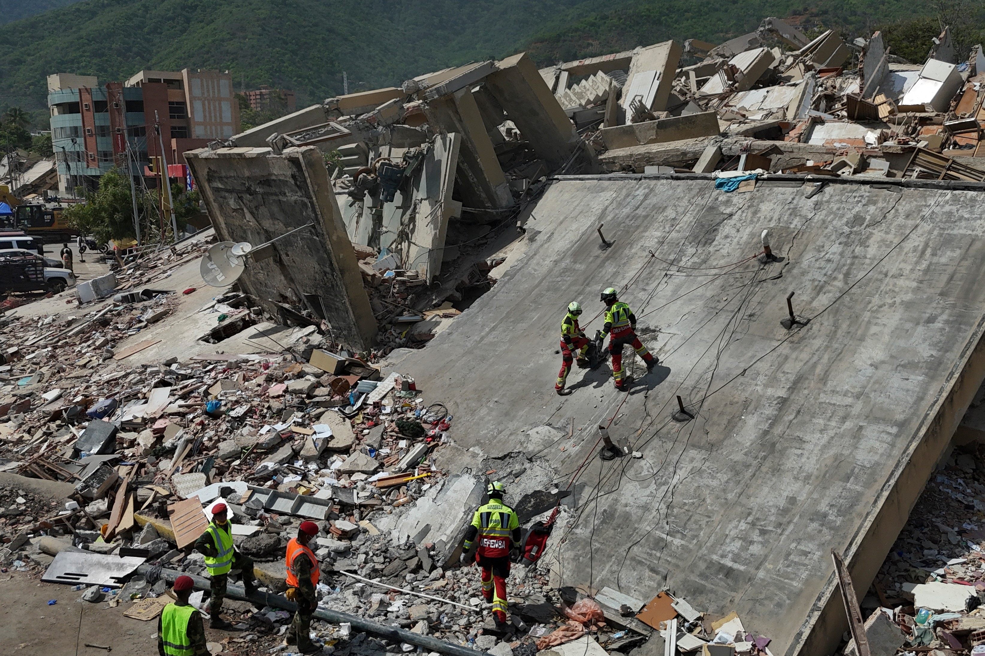 Mexican Army rescuers search through rubble. Photo: AP