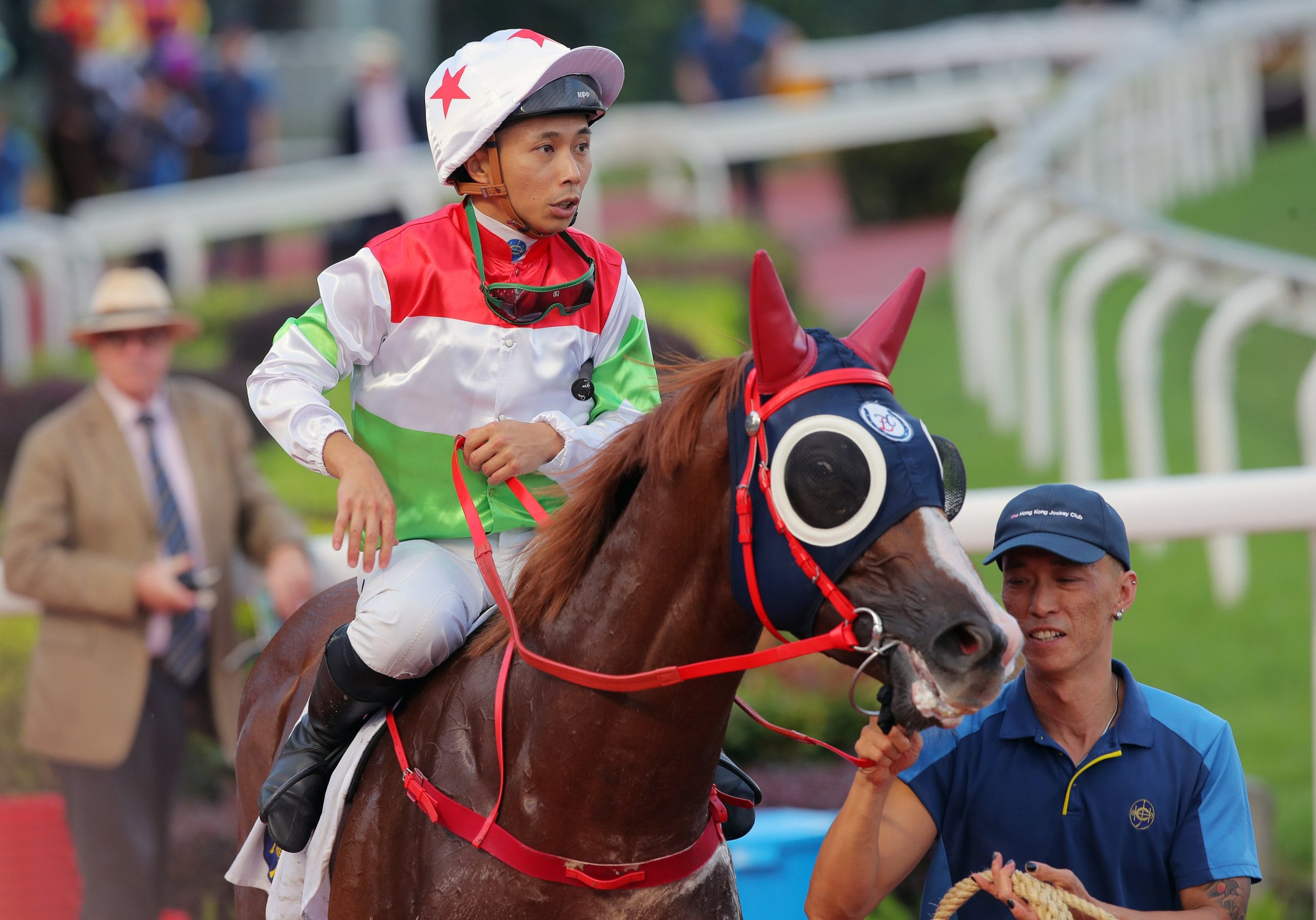 Matthew Poon aboard his last winner, The Red Hare at Sha Tin.
