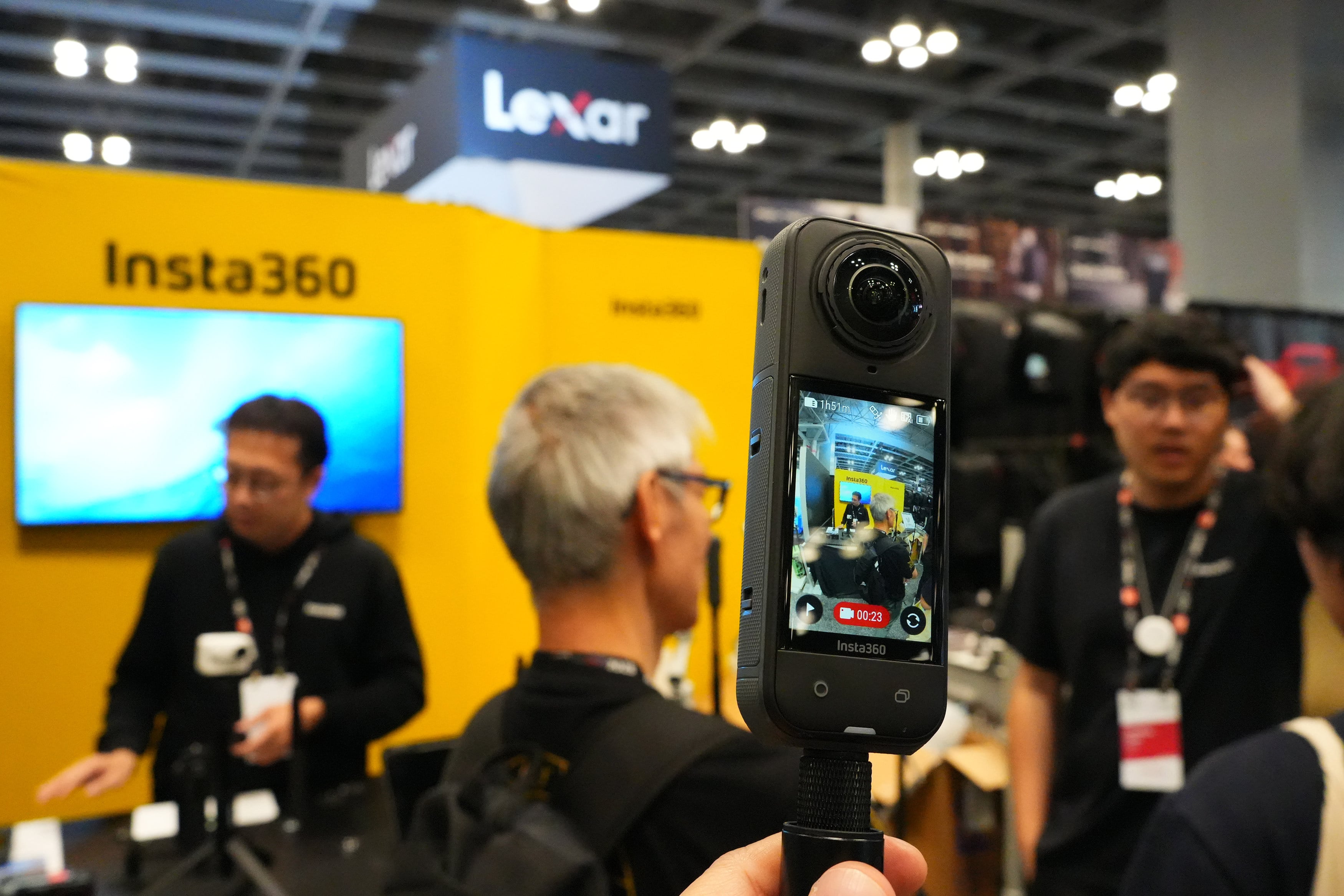People visit the Insta360 booth at the BILD Expo in New York, June 18, 2025. Photo: China News Service/VCG via Getty Images
