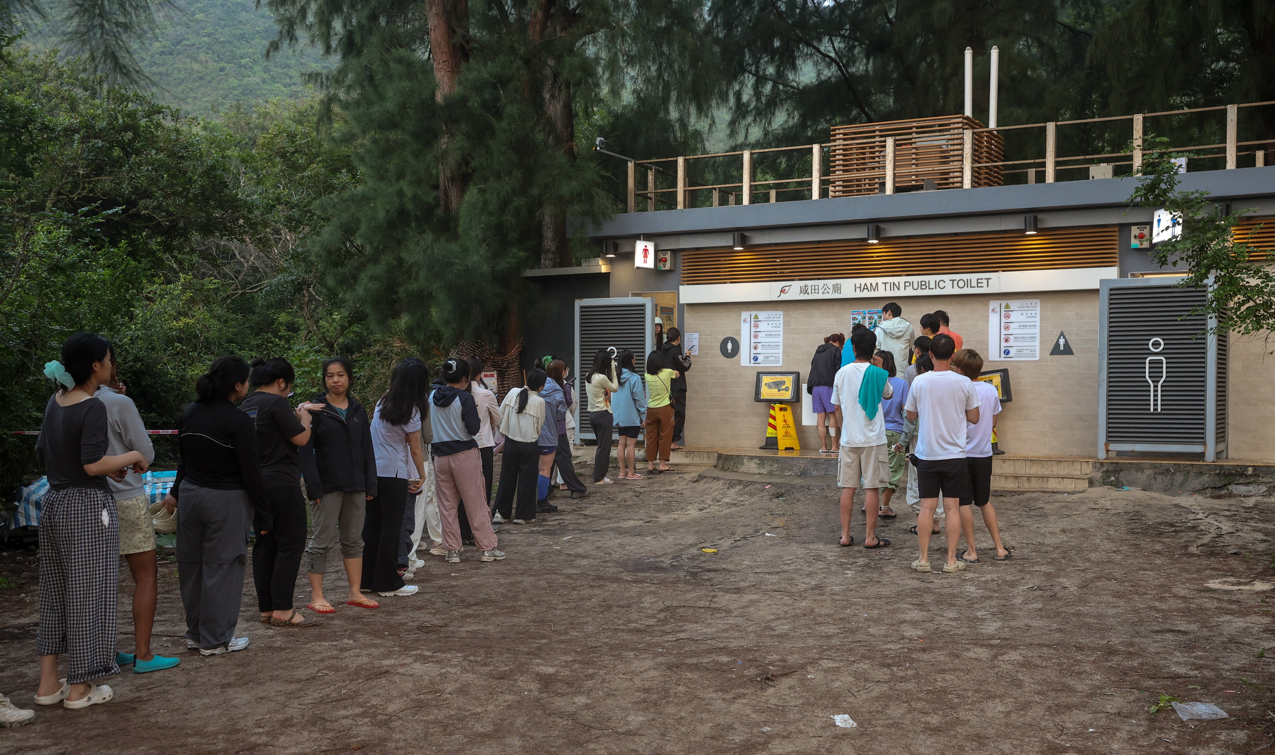 Visitors queuing to use a toilet in Ham Tin, Sai Kung East Country Park. The city’s ombudsman has cited “deficiencies” in repair work and cleaning services in Hong Kong’s country parks. Photo: Edmond So
