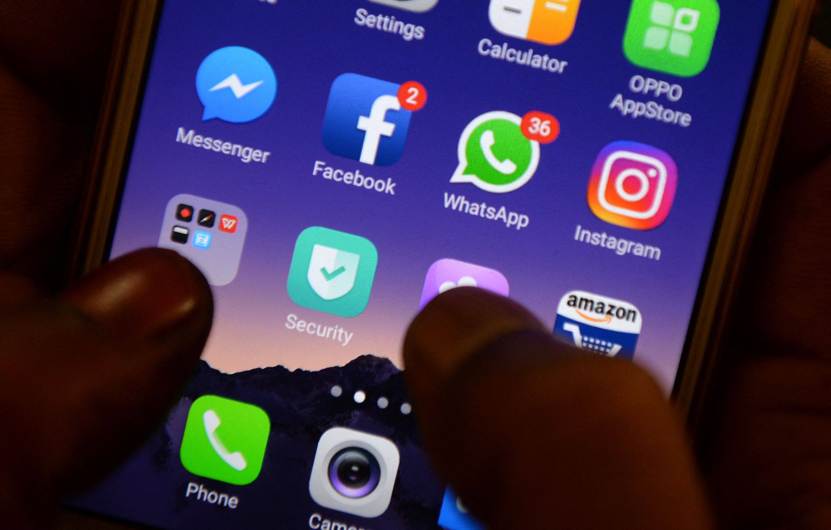 The victim had communicated with scammer using a WhatsApp profile featuring a professionally dressed woman. Photo: AFP