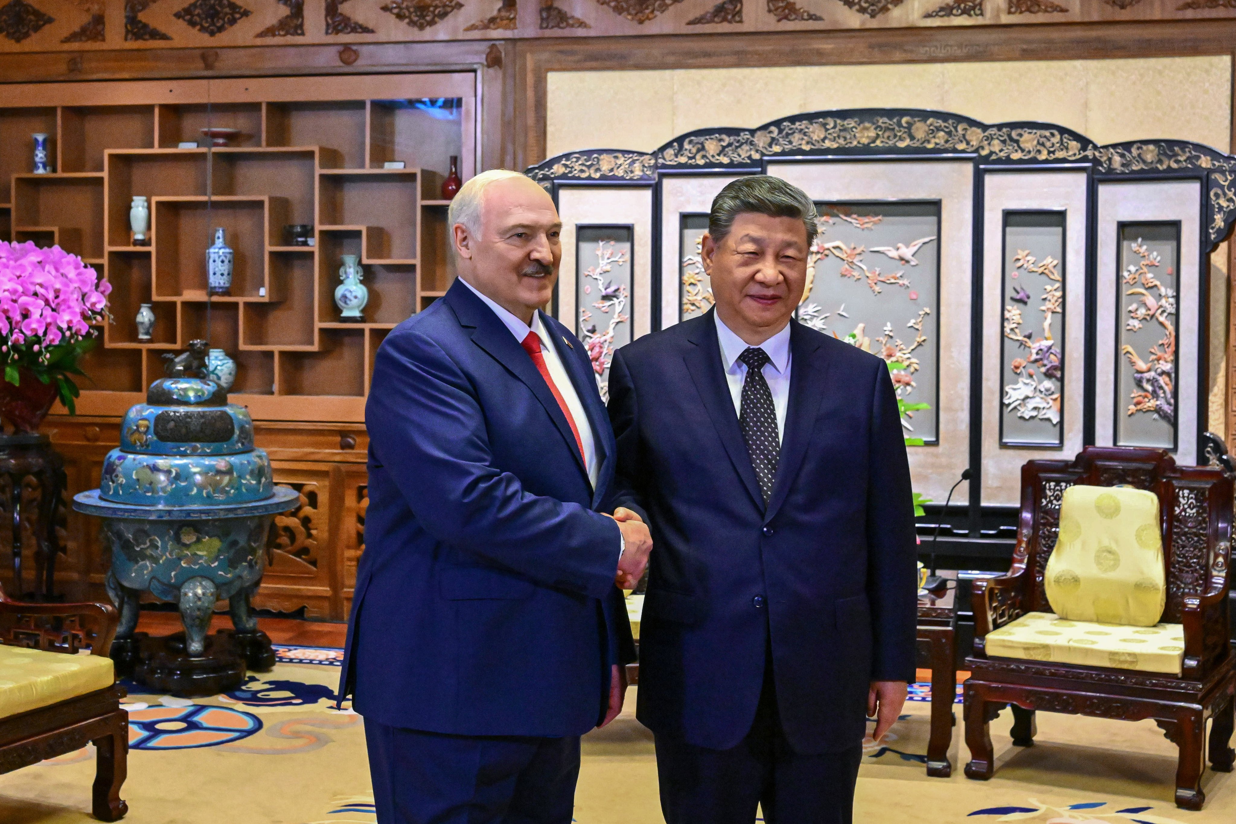 Belarusian President Alexander Lukashenko, left, and Chinese President Xi Jinping at the Diaoyutai State Guesthouse in Beijing, China on Monday. Photo: Belarusian Press Service / EPA / Handout
