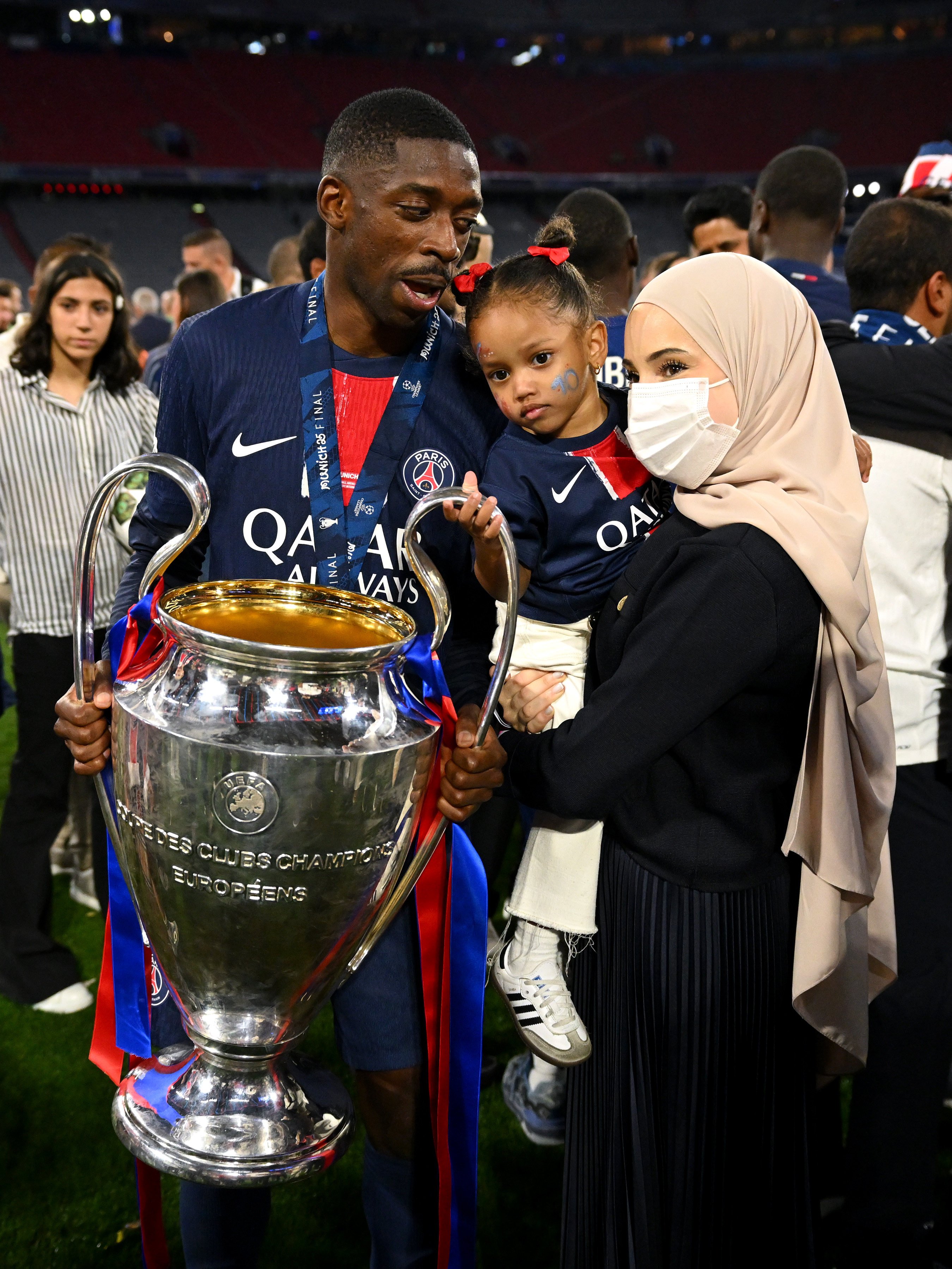 Ousmane Dembélé with his wife, Rima Edbouche, and daughter after his team Paris Saint-Germain’s victory at the UEFA Champions League Final last May. Photo: Getty Images