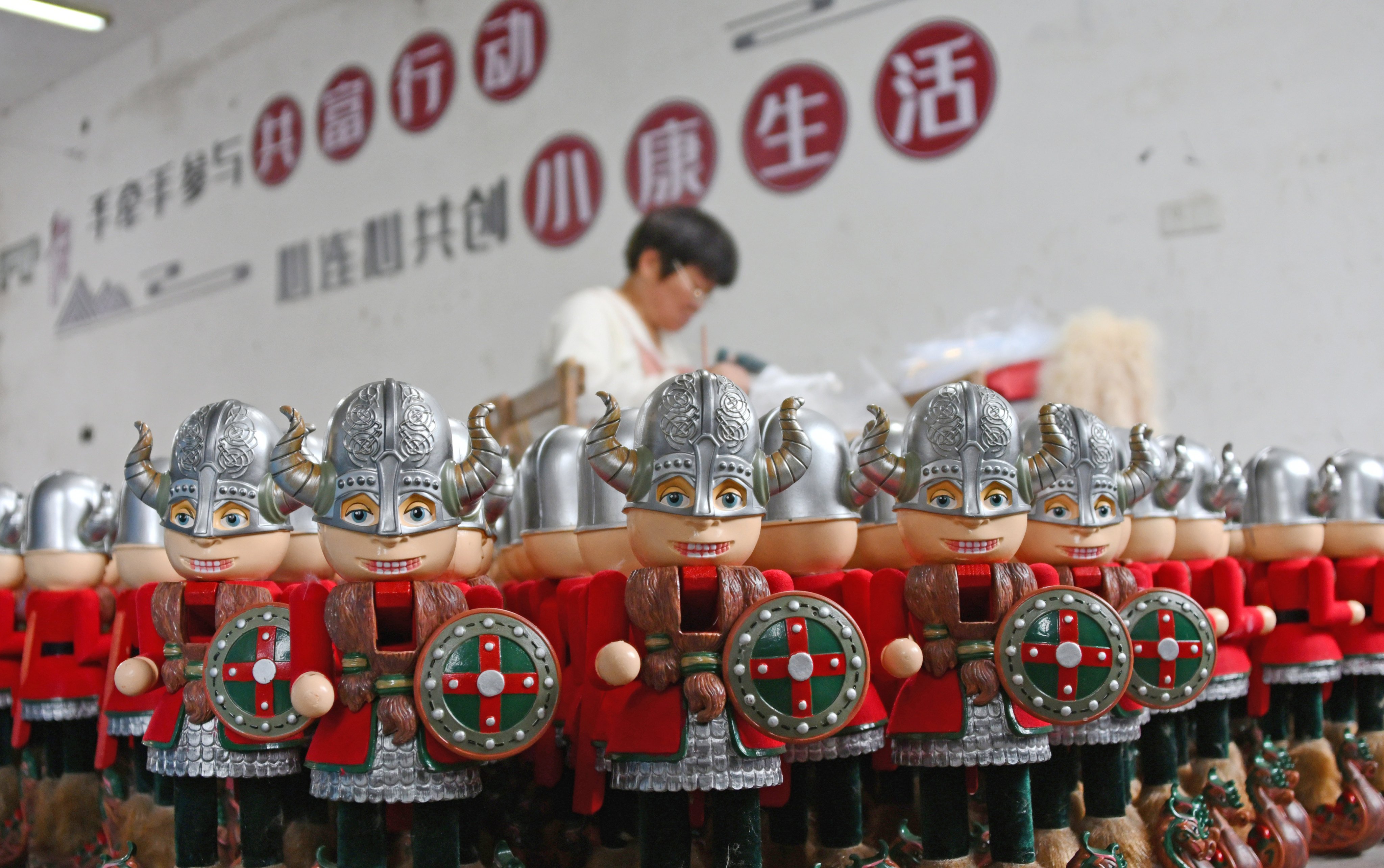 A worker produces handicrafts for export at a gift factory in Taizhou City, Zhejiang province, June 25, 2026. Photo: VCG via Getty Images