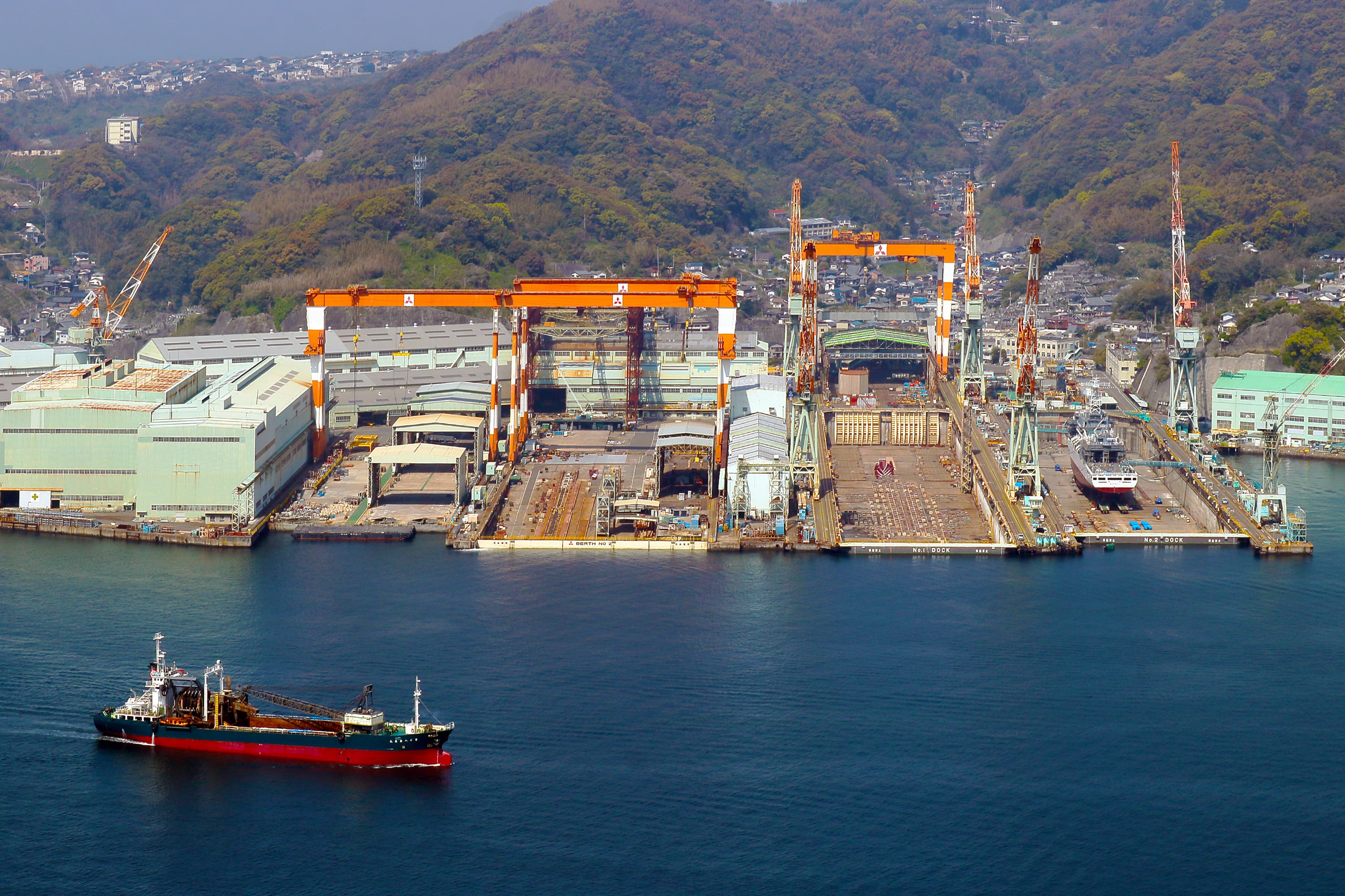 Mitsubishi Heavy Industries’ shipbuilding factory near Dejima port in Nagasaki bay in Japan. Photo: Shutterstock