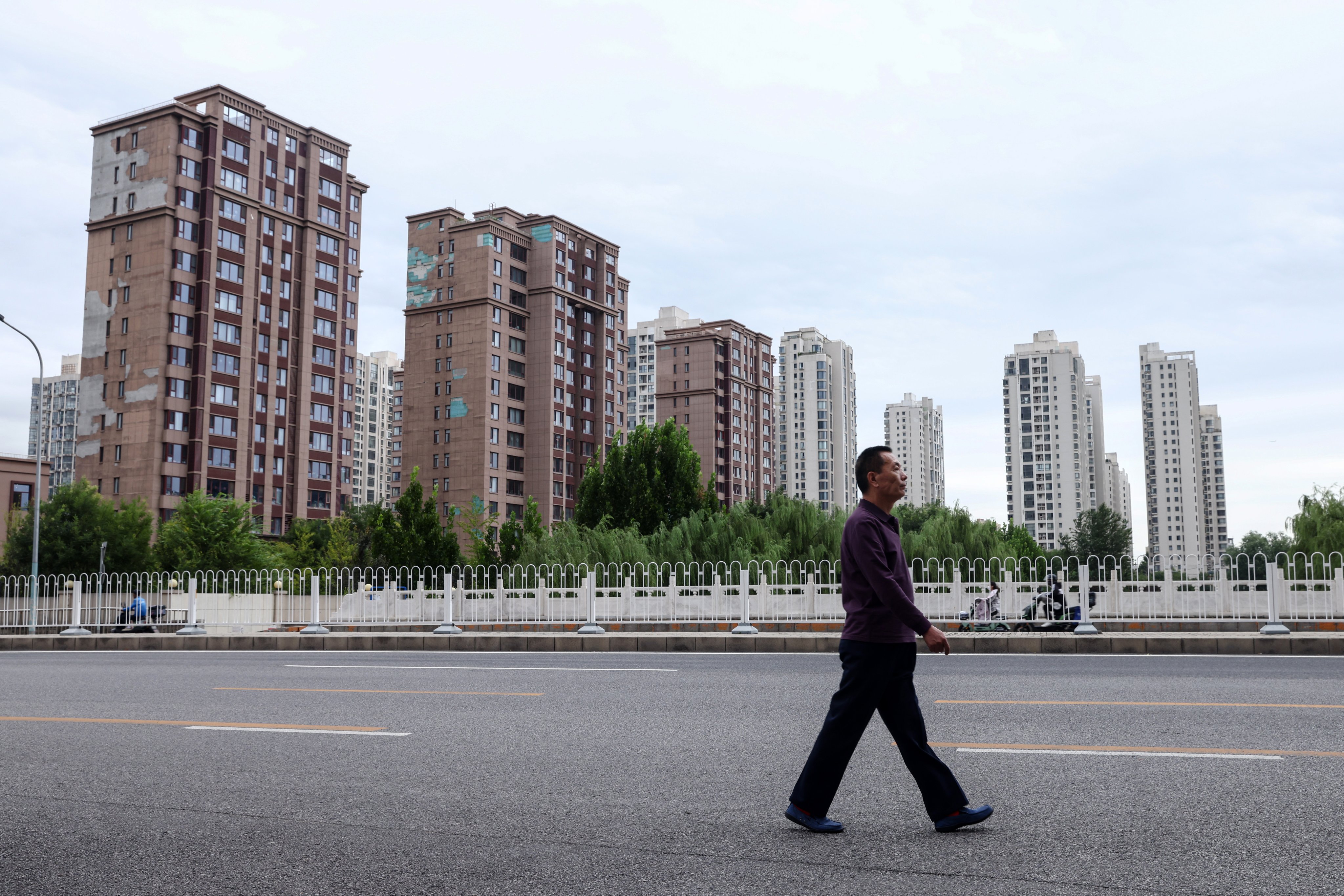 Residential buildings in Beijing on September 15, 2025. China’s property sector, once accounting for roughly a quarter of the economy, has remained sluggish since late 2020, eroding household wealth. Photo: EPA