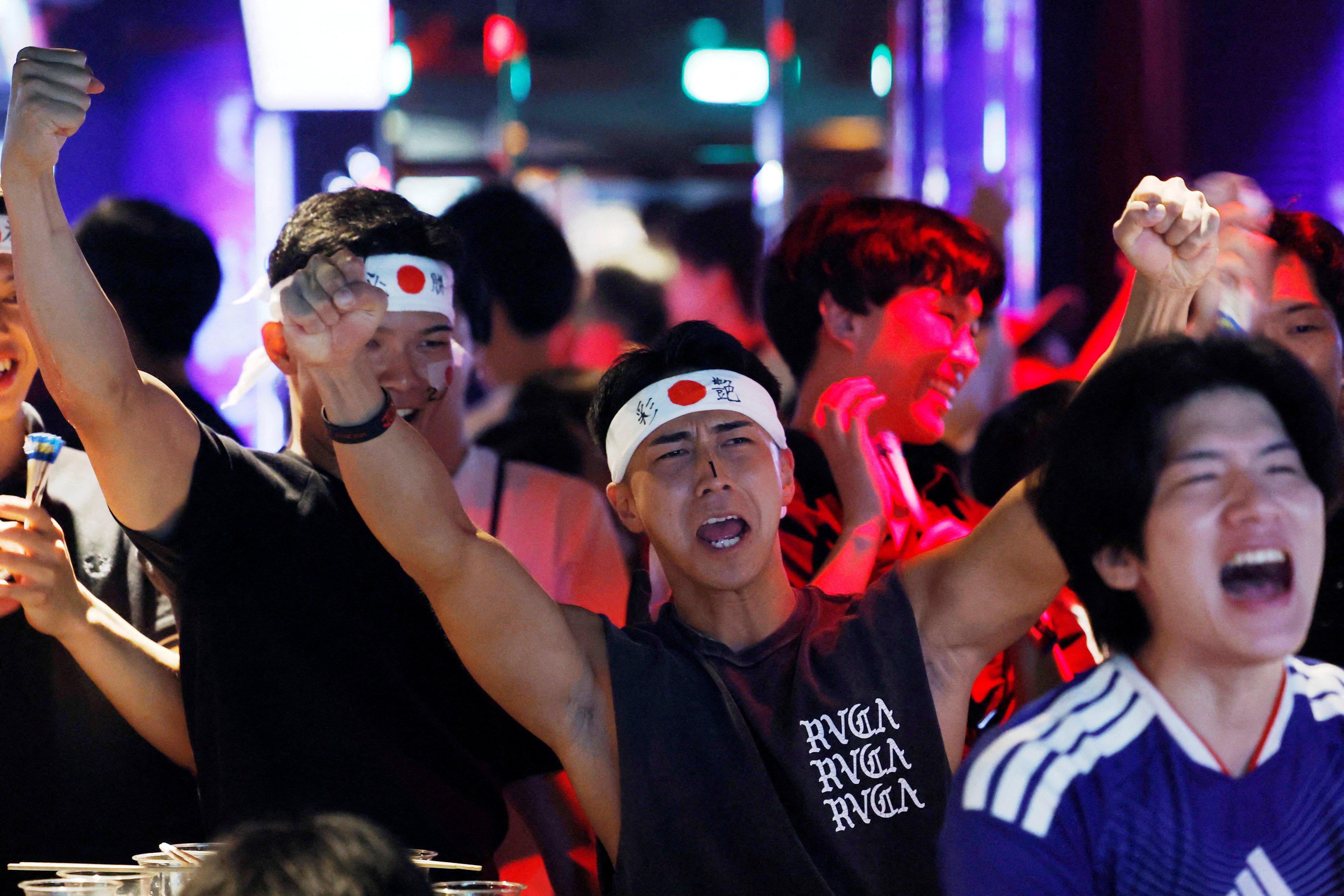 Soccer Football - FIFA World Cup 2026 - Round of 32 - Brazil v Japan - Fans gather in Tokyo - Tokyo, Japan - June 30, 2026
Japan fans react at the Bee Bar in Tokyo during the match REUTERS/Kim Kyung-Hoon     TPX IMAGES OF THE DAY