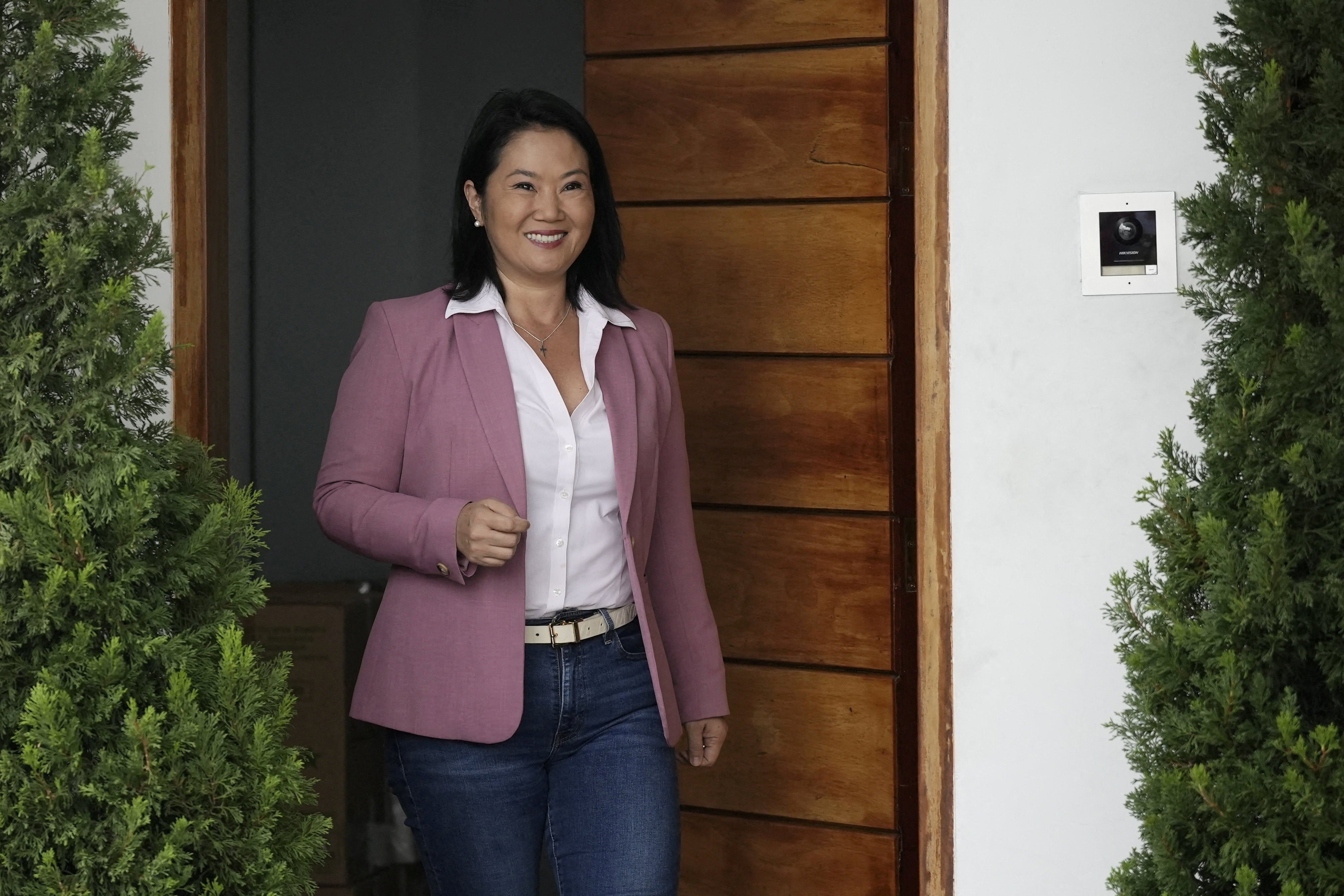 Keiko Fujimori outside her home in Lima. Following a razor-thin run-off victory, the conservative political heir has become the first woman popularly elected to the nation’s presidency. Photo: Reuters