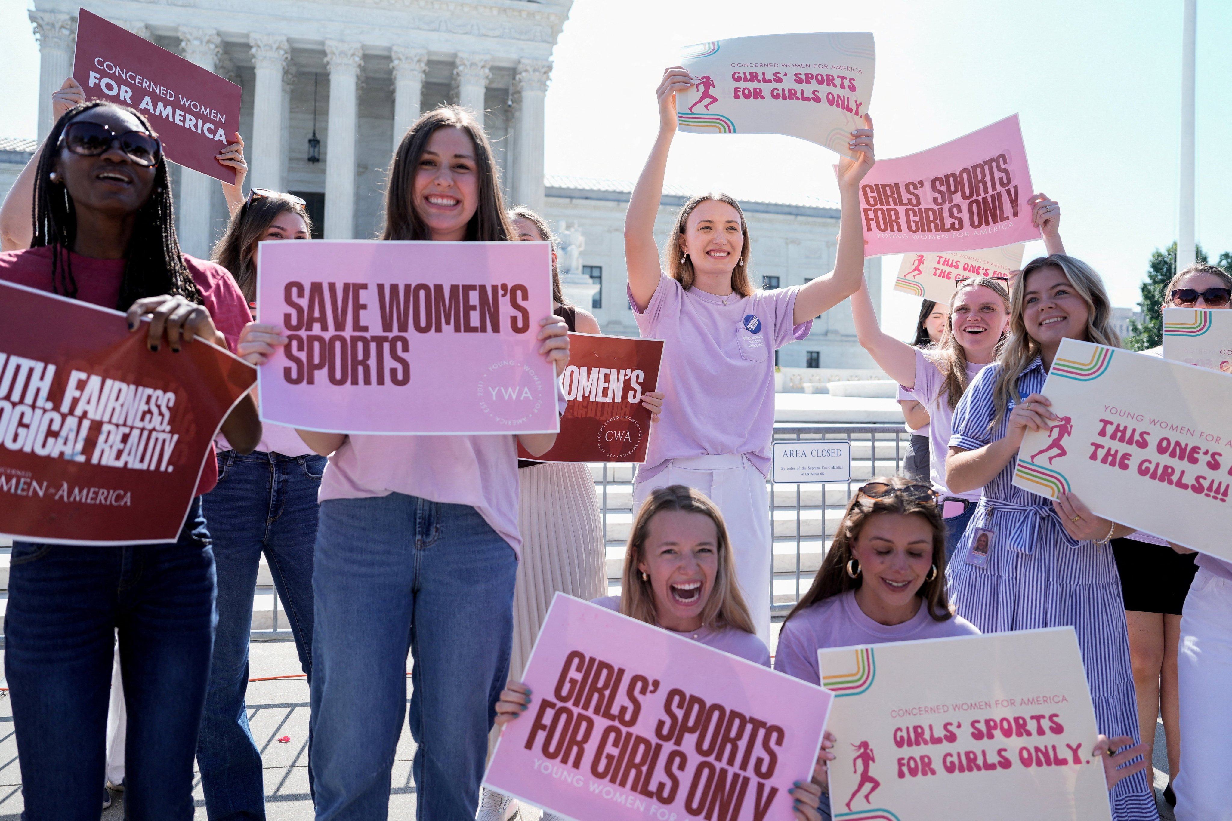 Women celebrate the US Supreme Court’s final rulings of its nine-month term, including a decision that cleared the way for states to impose restrictions on transgender athletes in schools. Photo: Reuters