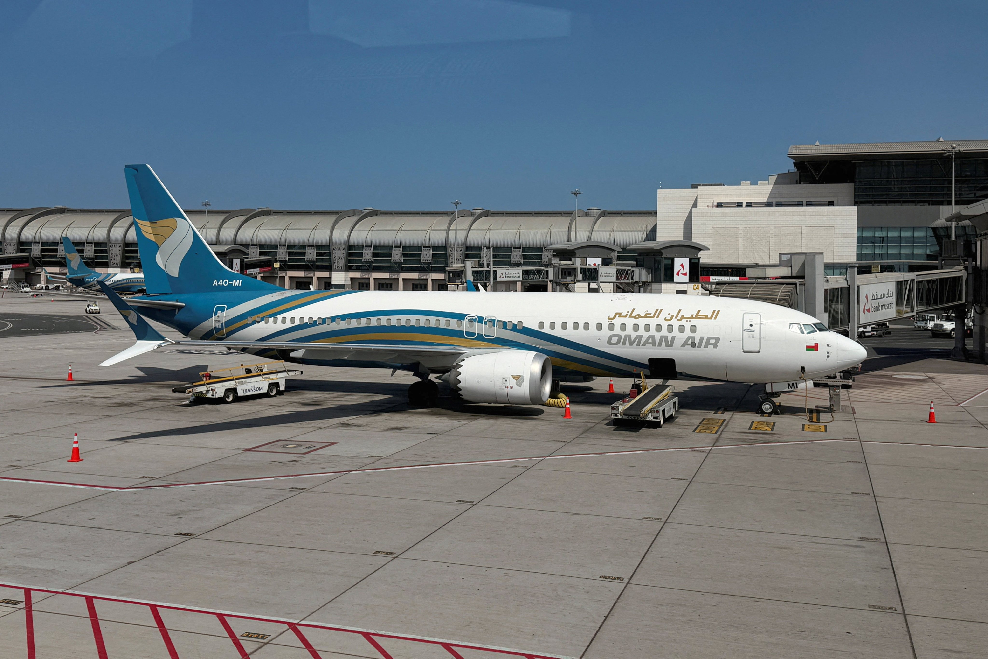 A Boeing 737 Max 8 operated by Oman Air sits on the tarmac at Muscat International Airport on March 13. Photo: Reuters