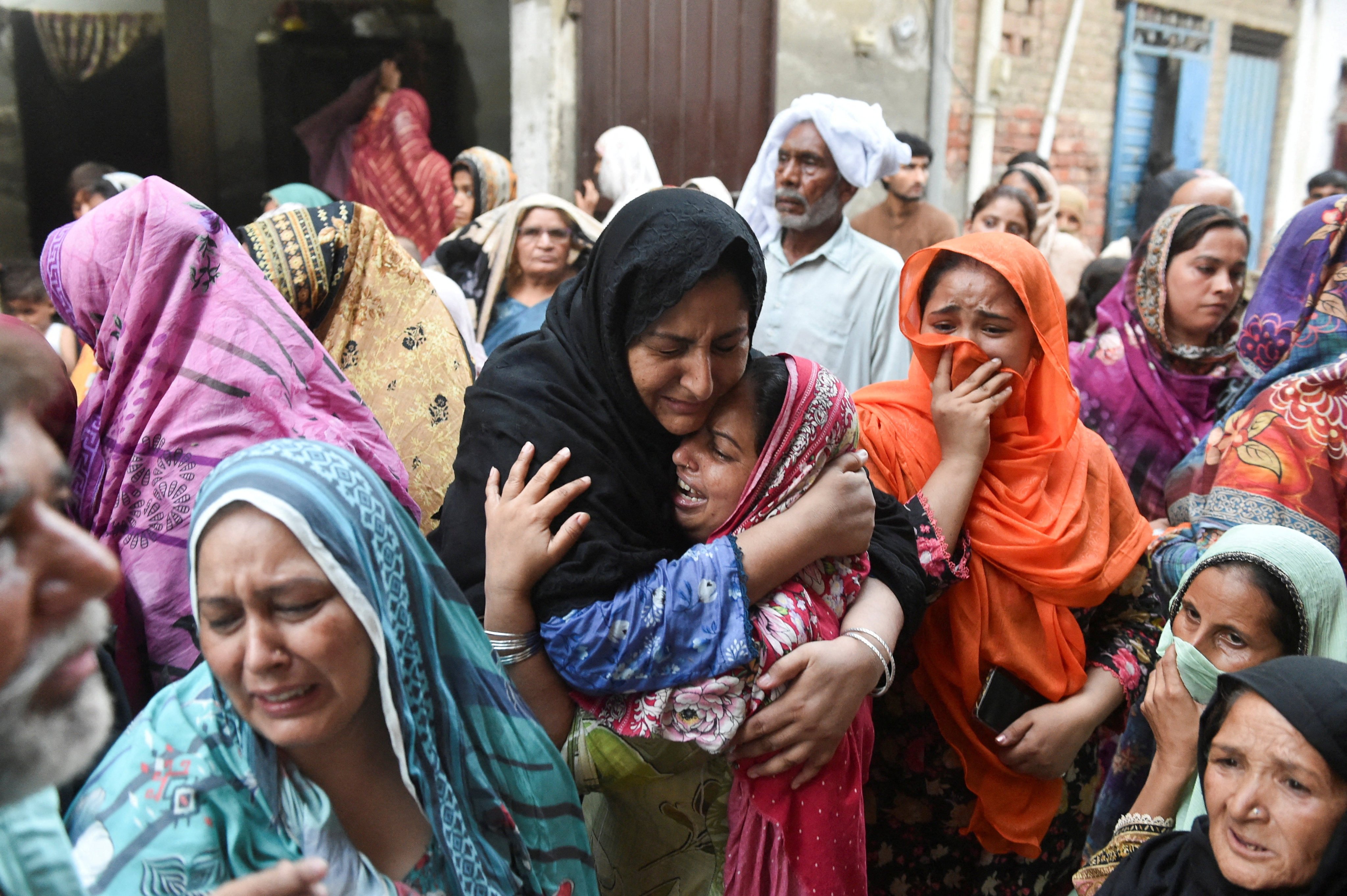 Relatives of the children who reportedly died after a tuition center roof collapsed, mourn in Lahore, Pakistan, June 30, 2026. REUTERS/Murtaza Ali     TPX IMAGES OF THE DAY
