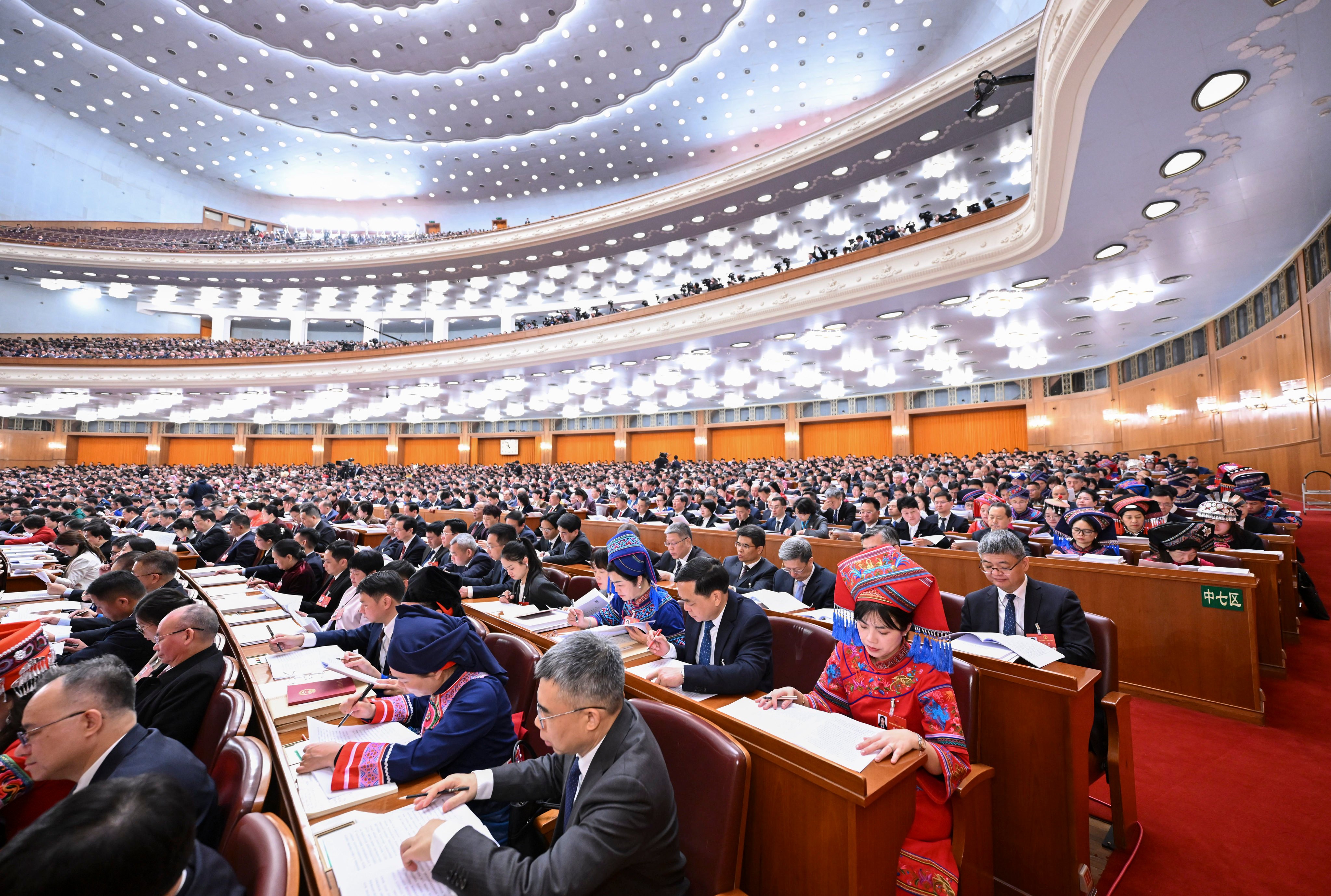 Delegates attend the opening meeting of the fourth session of the 14th National People’s Congress at the Great Hall of the People in Beijing on March 5. Photo: Xinhua
