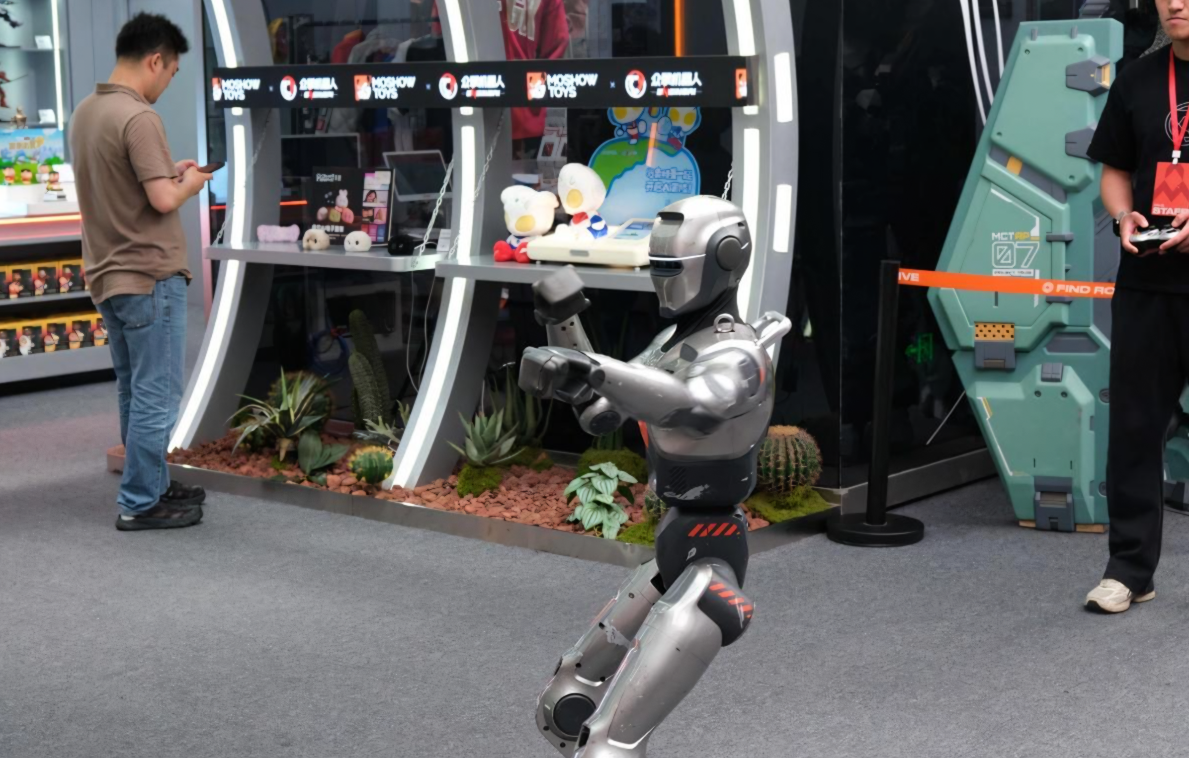 An EngineAI robot demonstrates martial arts movements in Shenzhen, as China pushes to expand its robotics industry. Photo: Korea Times