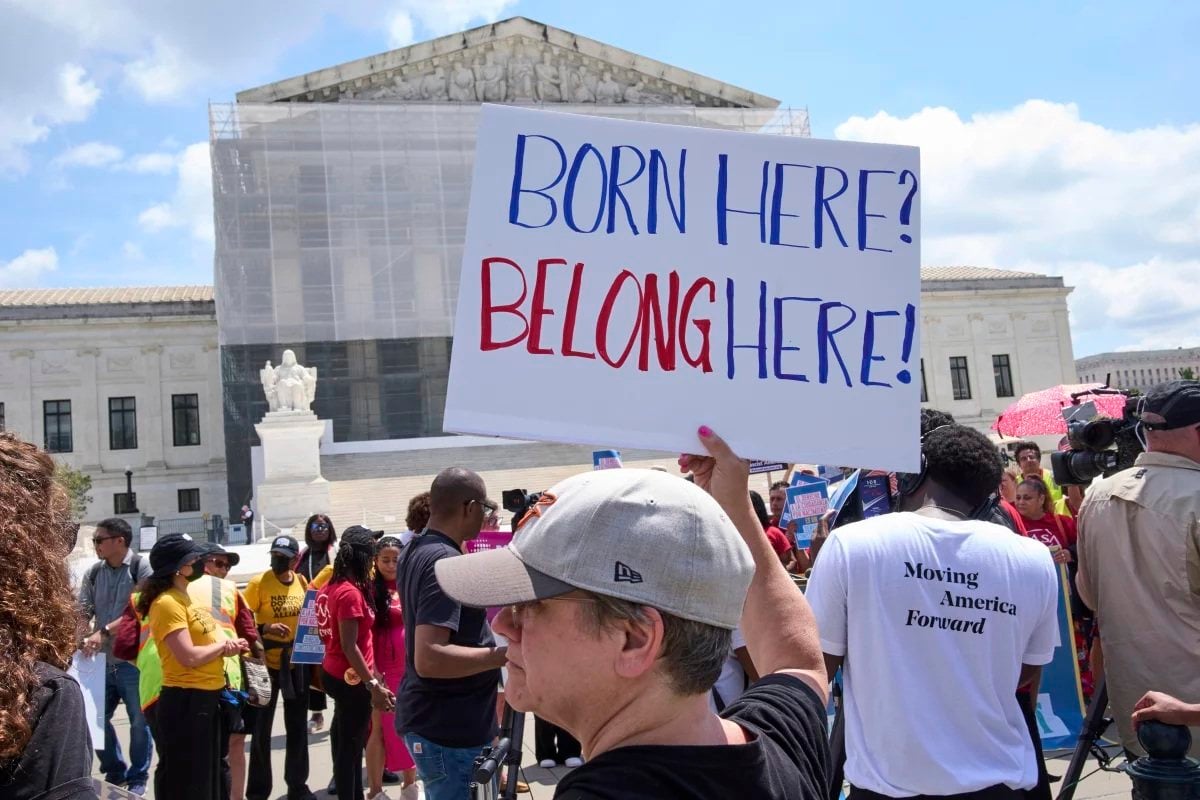 Jenny Harris, of Baltimore, protests in support of birthright citizenship and the immigrant community, on Thursday, May 15, 2025, outside of the Supreme Court in Washington. Photo: AP