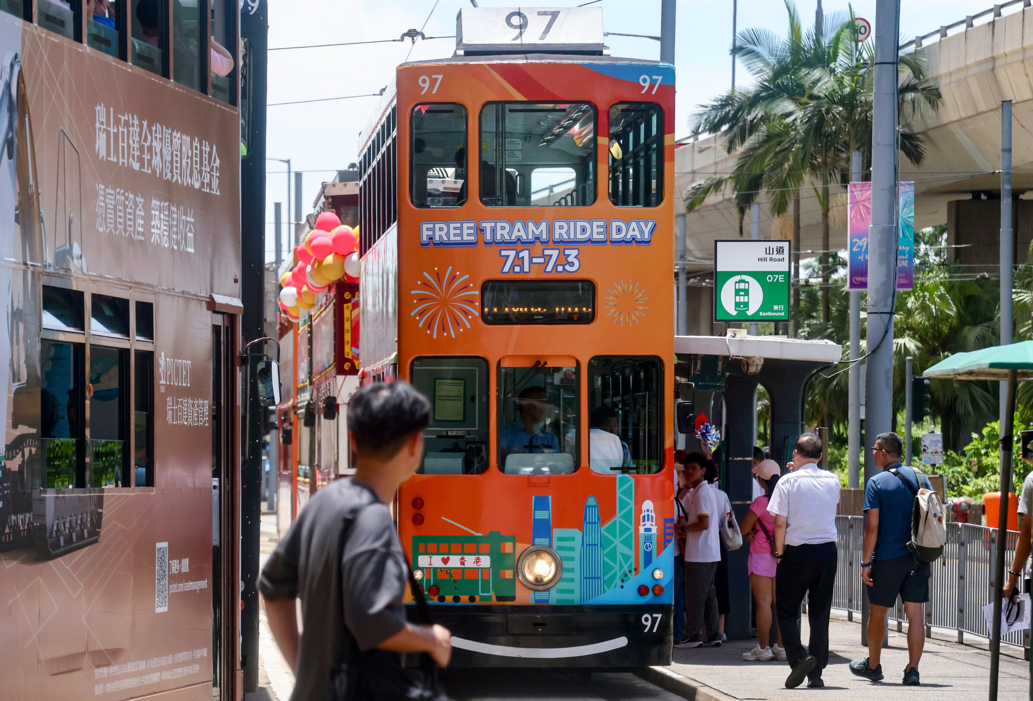 Hong Kong’s iconic "ding ding" trams spread festive cheer with free rides. Photo: Jonathan Wong
