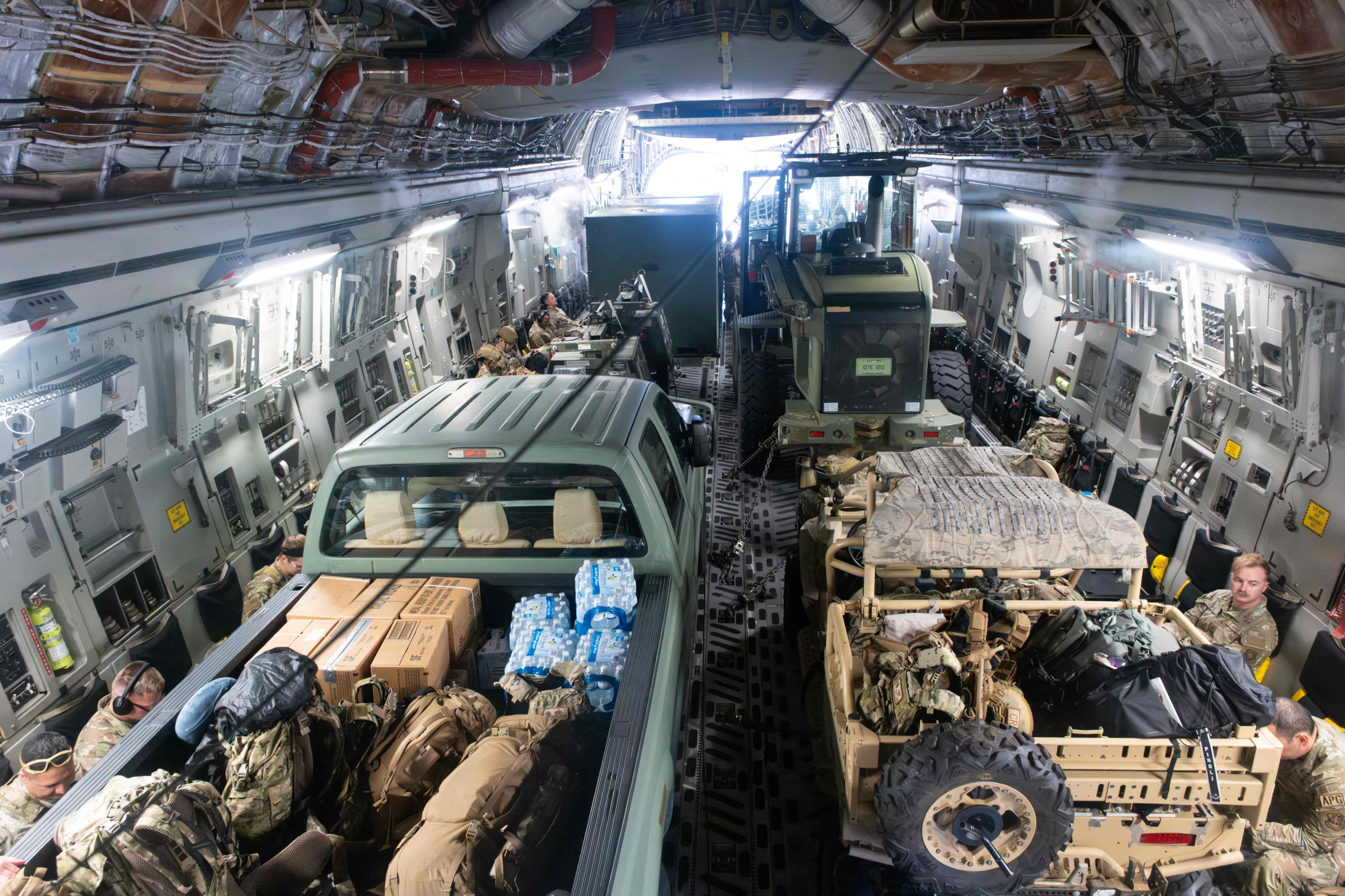A contingency response team and equipment on a C-17 Globemaster. Photo: US Air Force via AFP