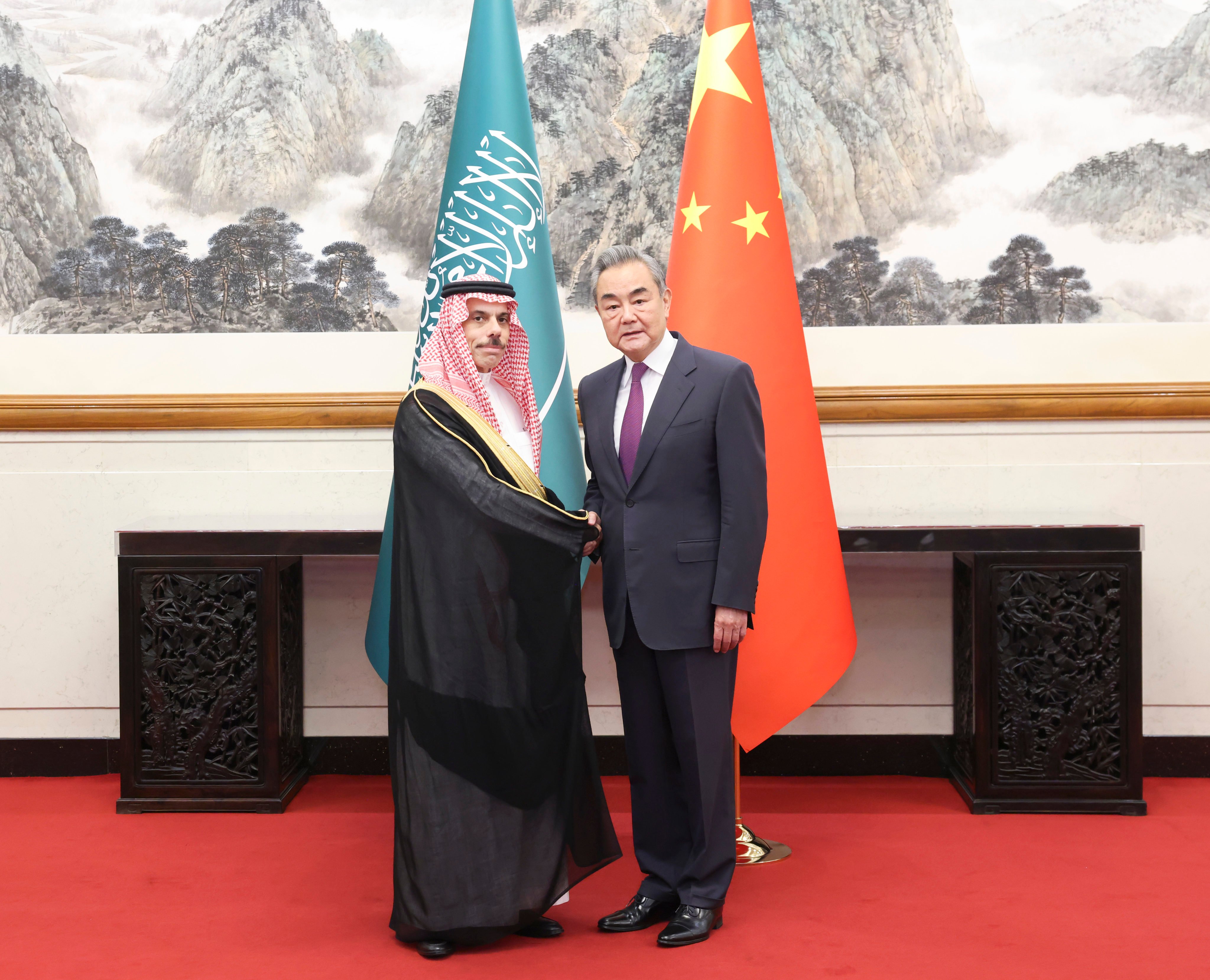 Chinese Foreign Minister Wang Yi (right) meets his Saudi counterpart Prince Faisal bin Farhan al-Saud in Beijing on Tuesday. Photo: Xinhua