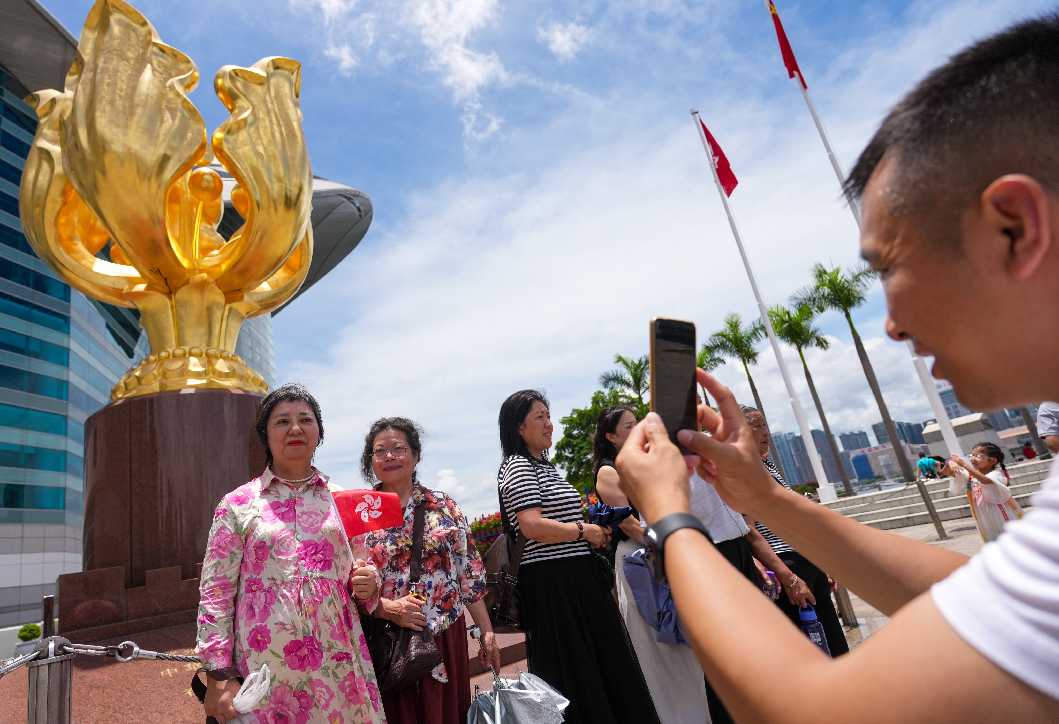 The Golden Bauhinia Square in Wan Chai is a photo hotspot for locals and visitors alike. Photo: Karma Lo