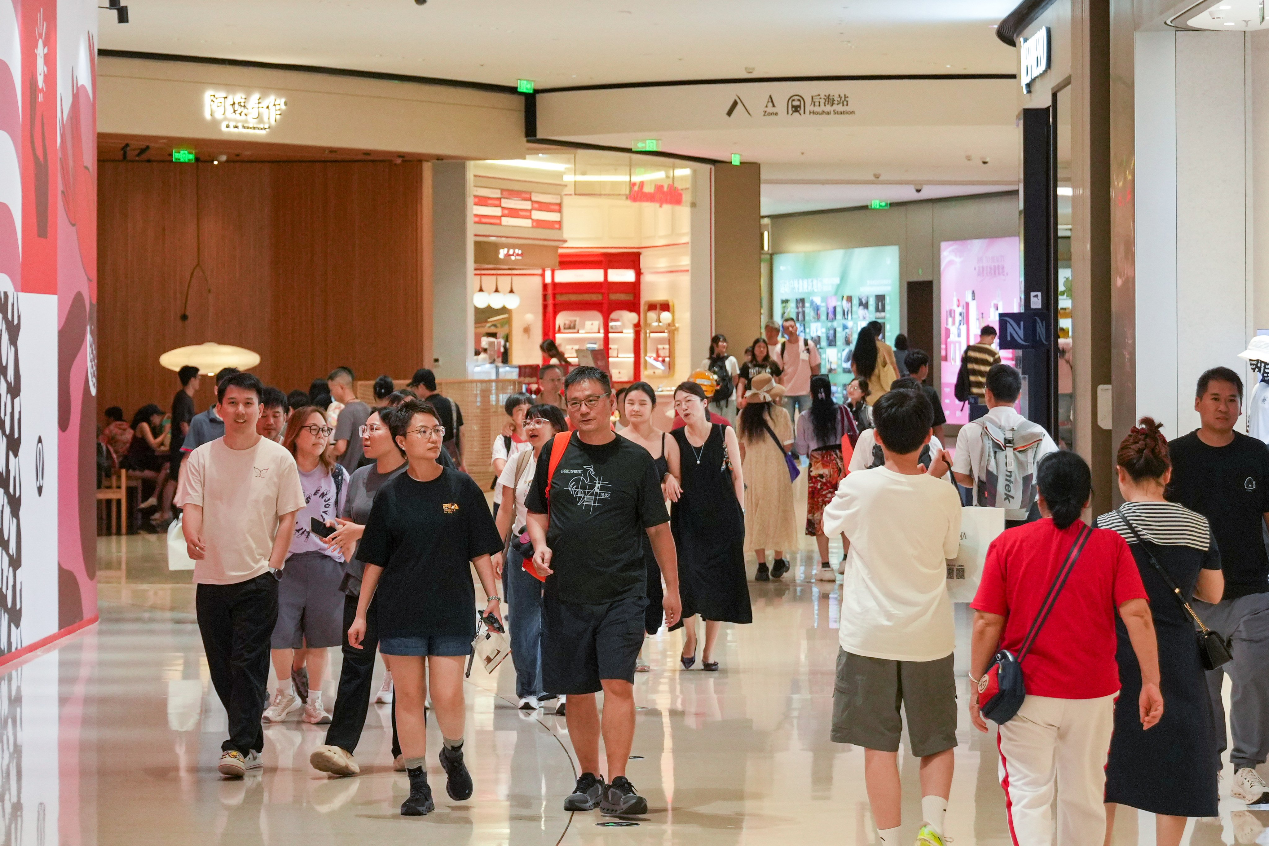 People visit MixC shopping centre in Nanshan, Shenzhen. Photo: May Tse