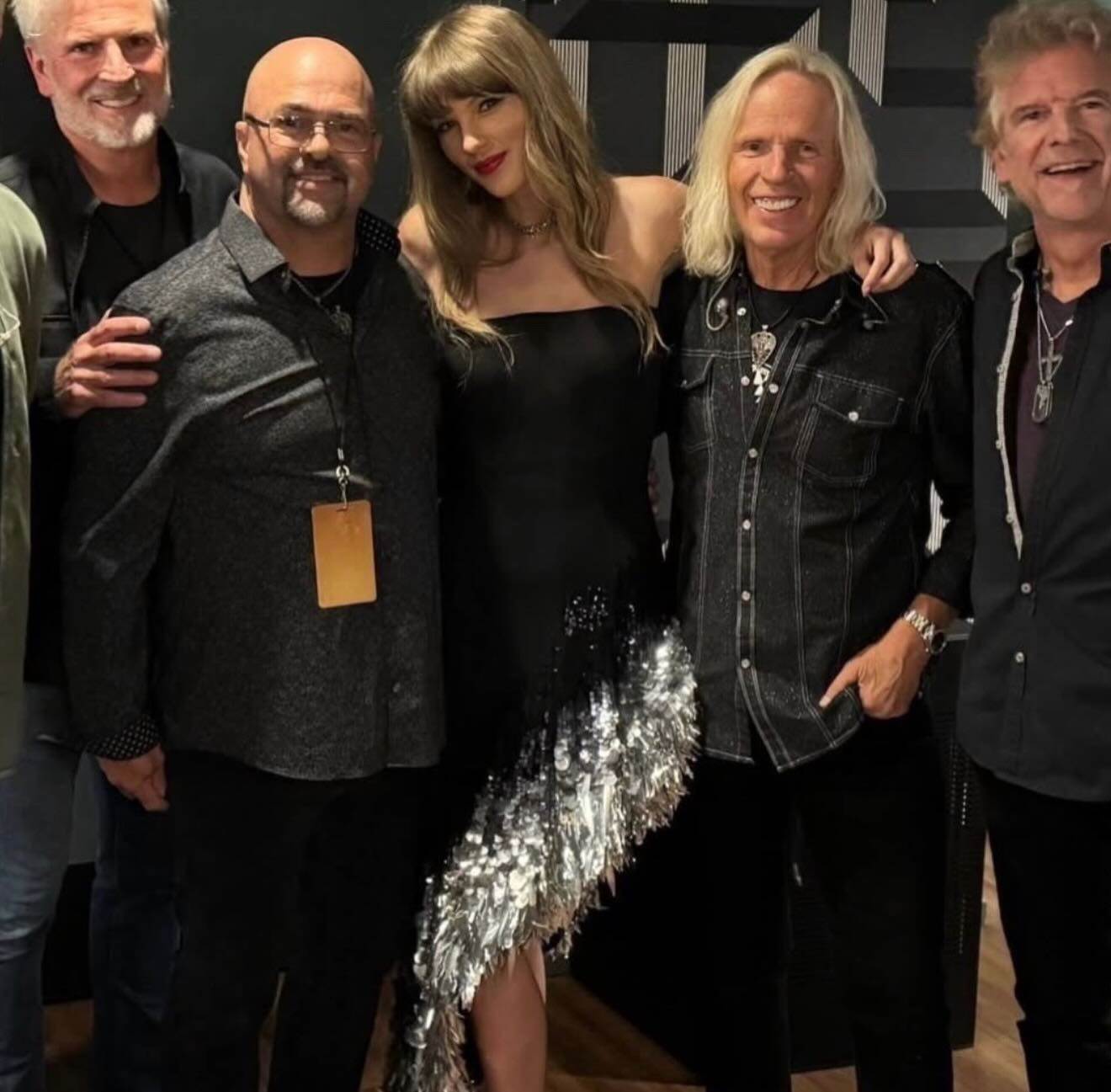 Taylor Swift (centre) this week, wearing Monse and posing with the band Sixwire. Photo: Photo: @tokibunbun/Instagram