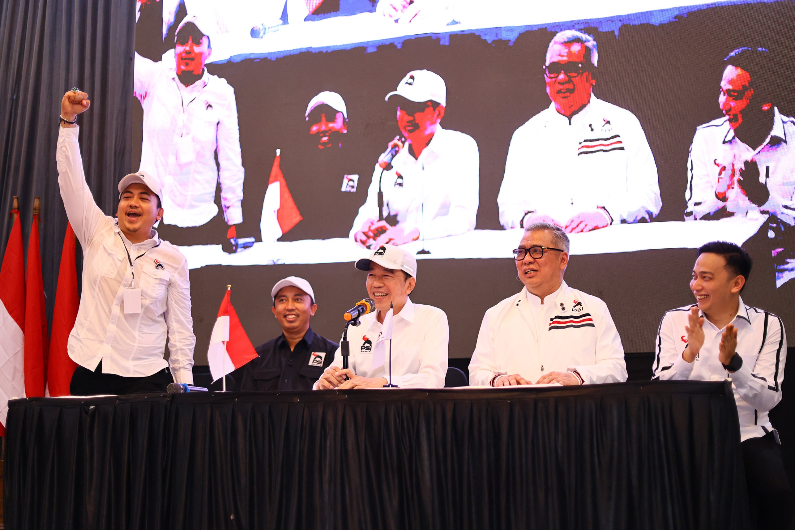 Ex-Indonesian president Joko Widodo (centre) attends the Indonesian Solidarity Party (PSI) congress in Lampung, alongside PSI Lampung chair Randy Gumanti (standing) and other party officials. Photo: PSI Lampung