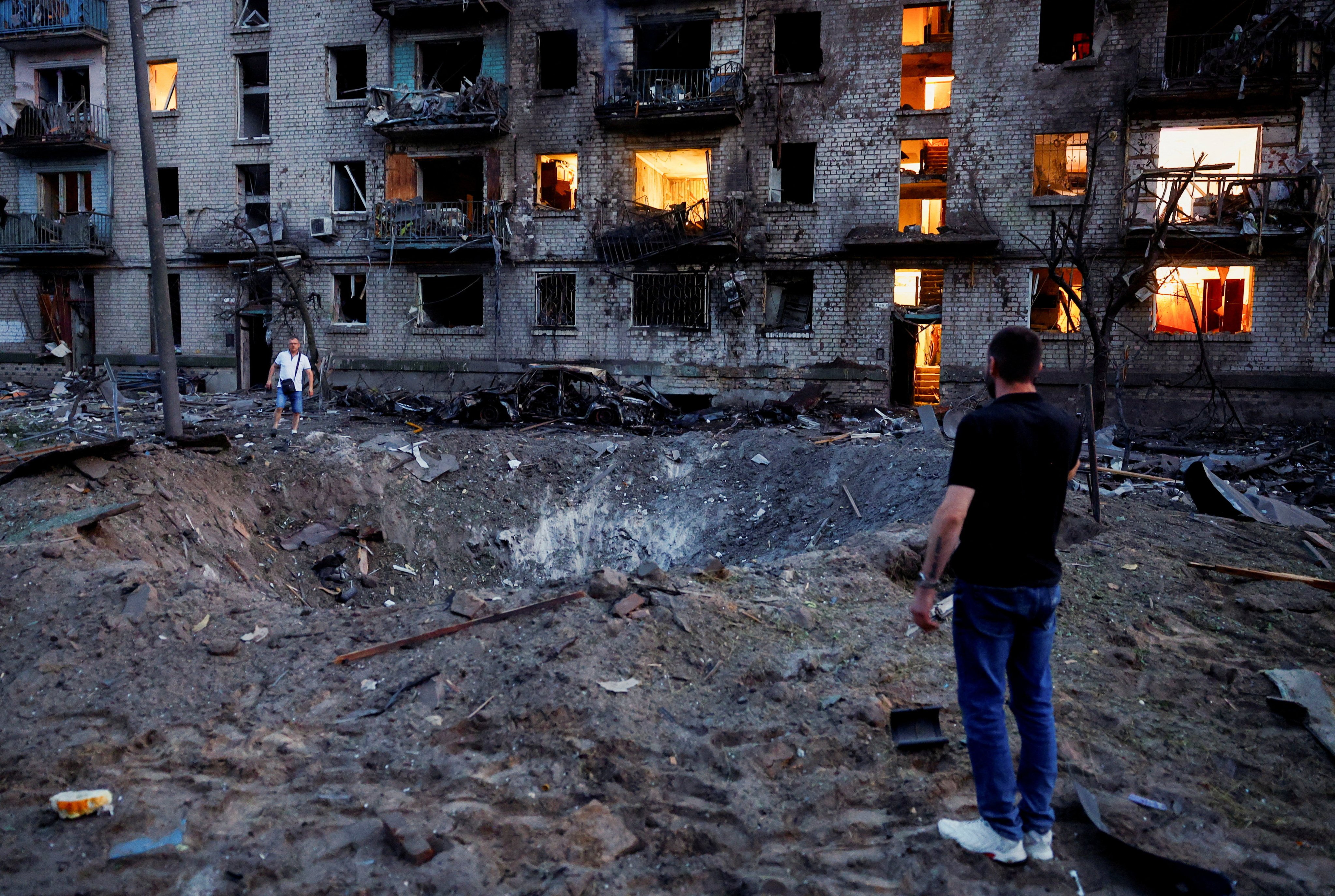 A crater from overnight Russian missile and drone strikes in Kyiv. Photo: Reuters