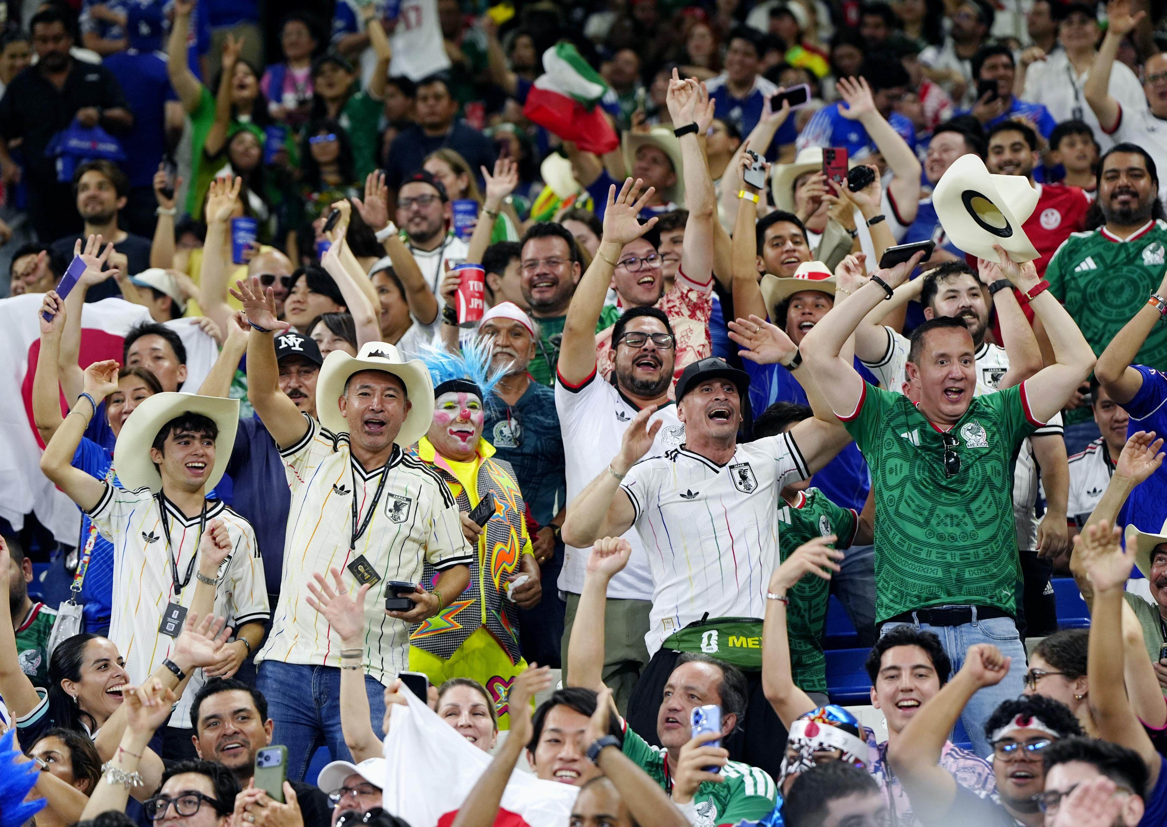Fans cheer for Japan during a World Cup Group F match against Tunisia at Monterrey Stadium in Guadalupe, Mexico, on June 20. Photo: Kyodo