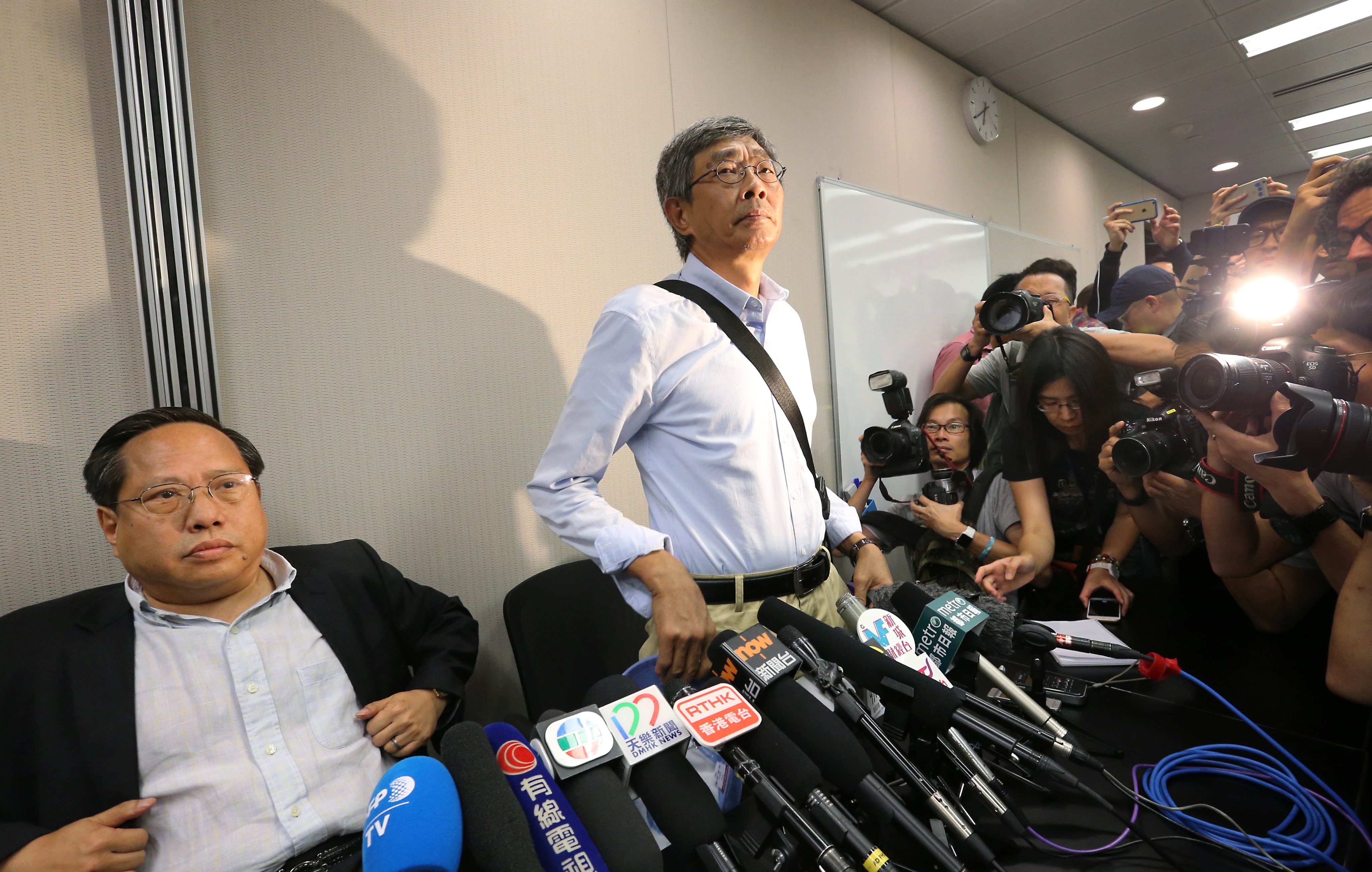 Then-lawmaker Albert Ho (left) and Lam Wing-kee meet the media at the Legislative Council complex in Tamar on June 16, 2016. Photo: Felix Wong
