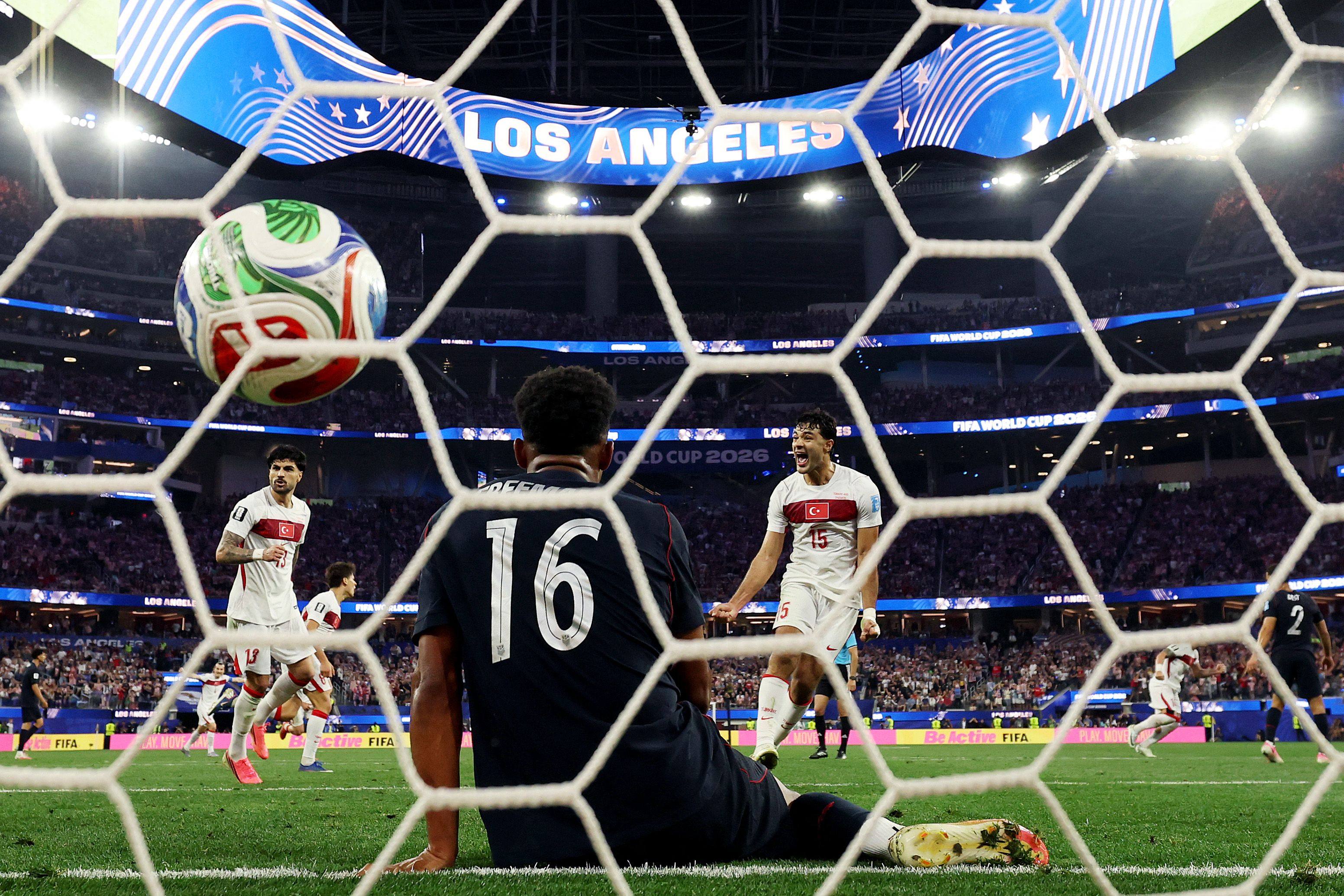 Ozan Kabak (right) celebrates as Kaan Ayhan’s goal seals a famous 3-2 win over the United States.  Photo: Getty Images