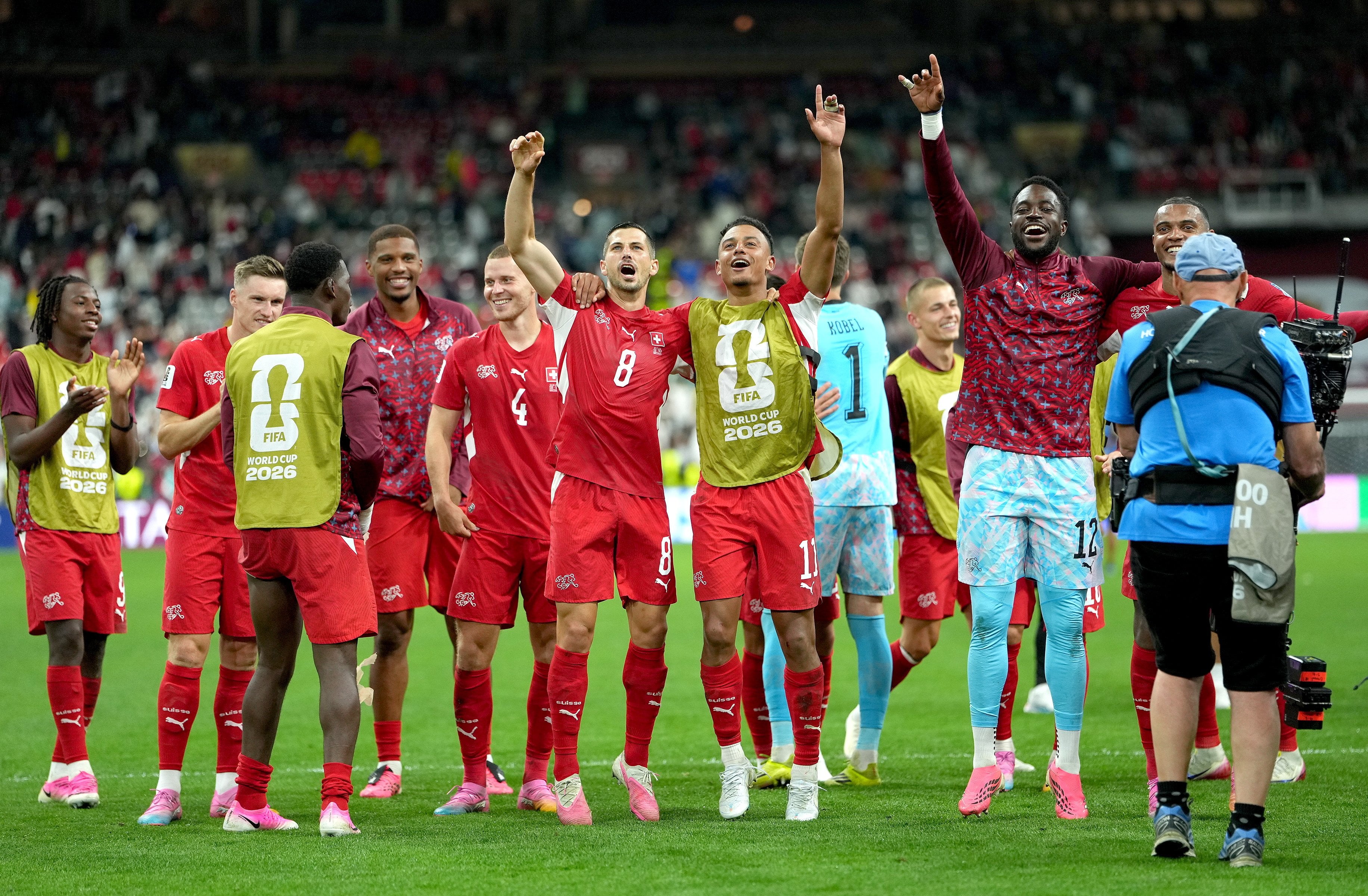 Switzerland players celebrate after winning the World Cup match against Algeria. Photo:  EPA