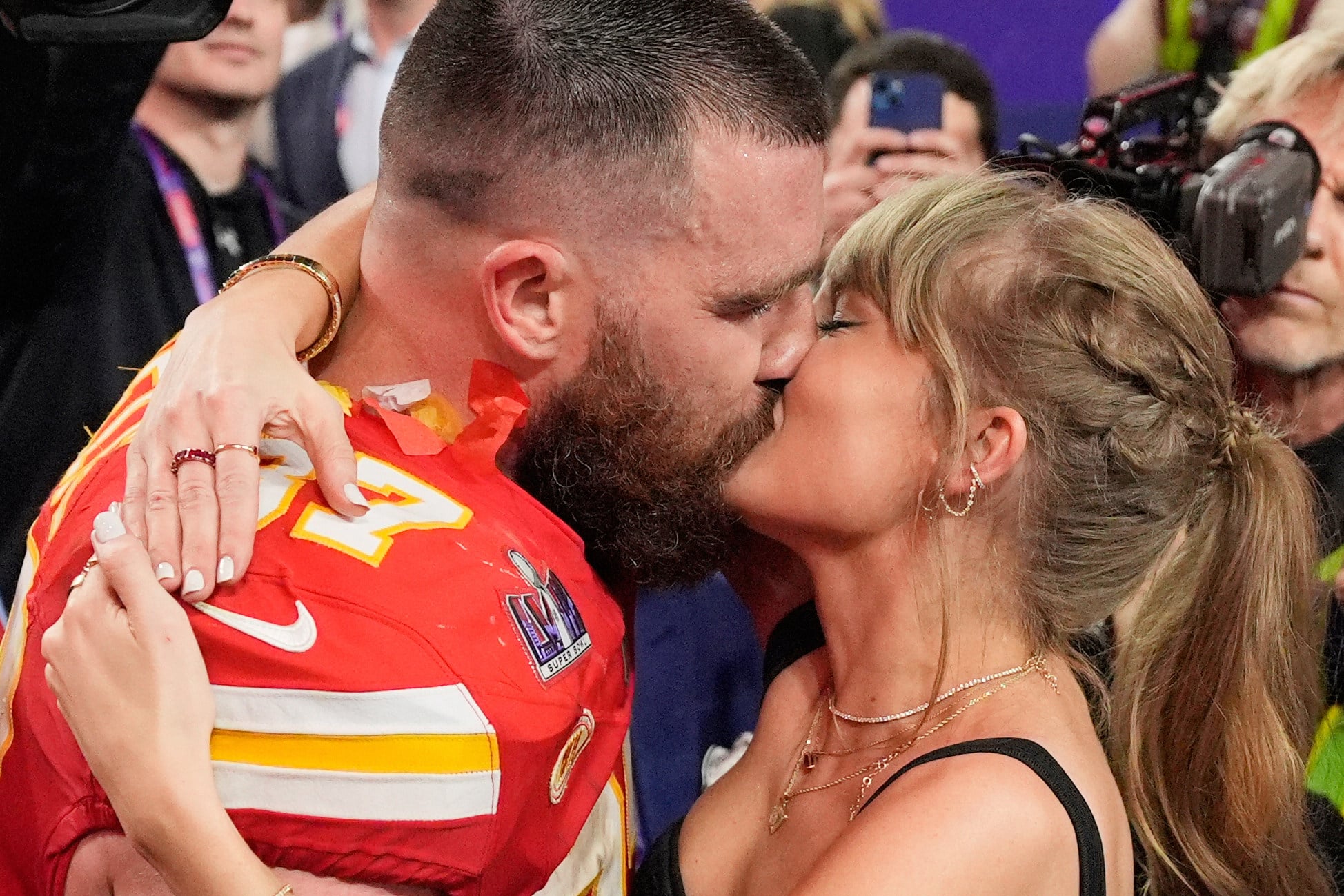 Travis Kelce and Taylor Swift kiss after the Kansas City Chiefs defeat the San Francisco 49ers in Las Vegas in February 2024. Photo: AP
