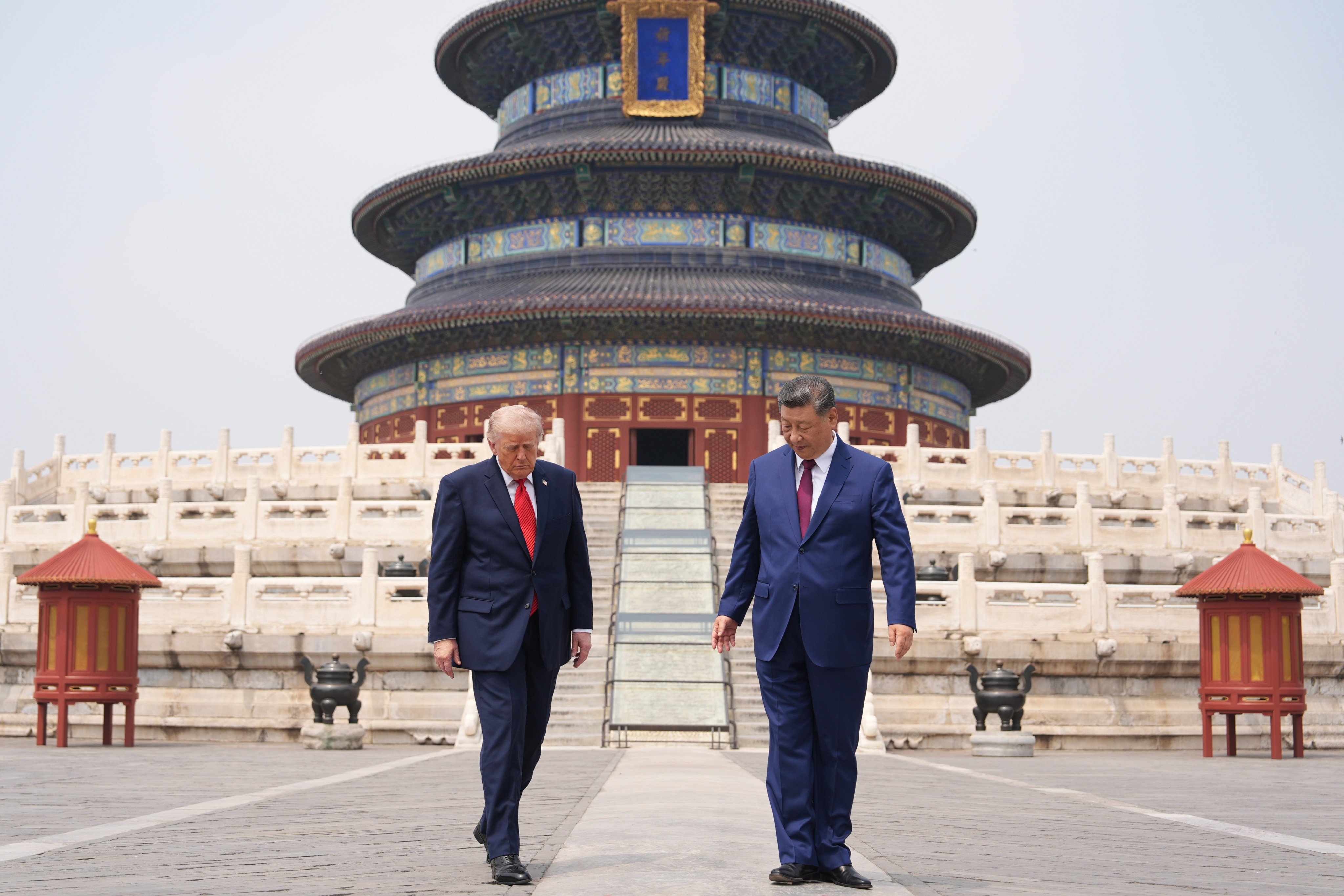 US President Donald Trump (left) walks with President Xi Jinping at the Temple of Heaven on May 14 in Beijing. Photo: AP