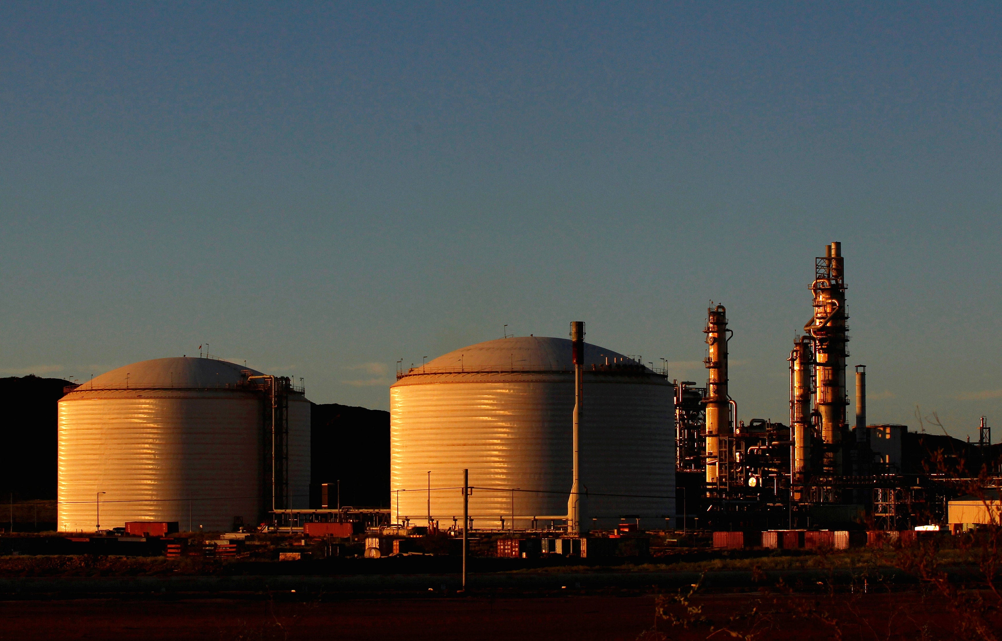 The Woodside Petroleum gas plant is seen at sunset in Burrup, Western Australia. Photo: Reuters