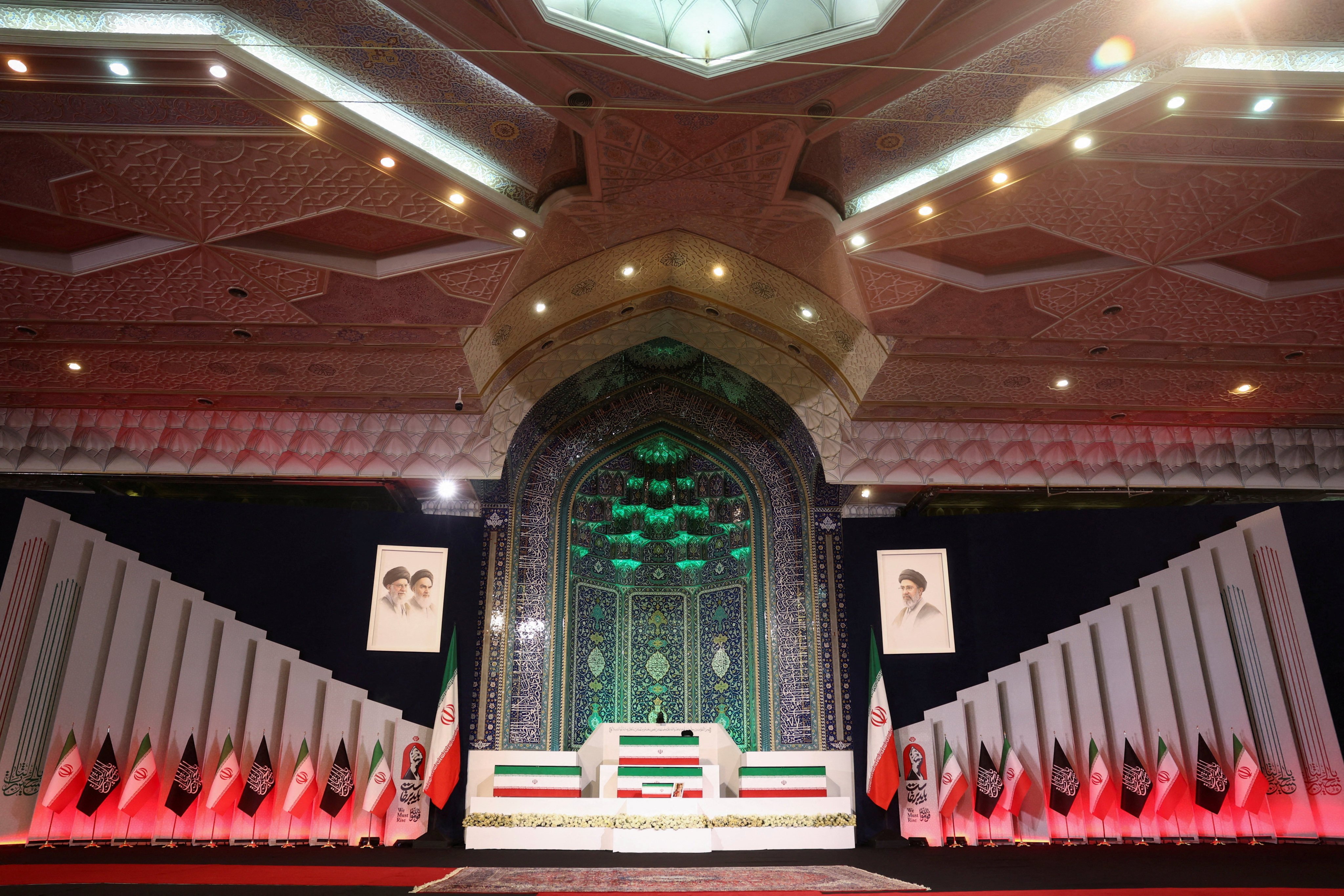The coffins of Iran’s late supreme leader Ayatollah Ali Khamenei and his family members displayed inside Tehran’s Grand Mosalla. Photo: West Asia News Agency via Reuters