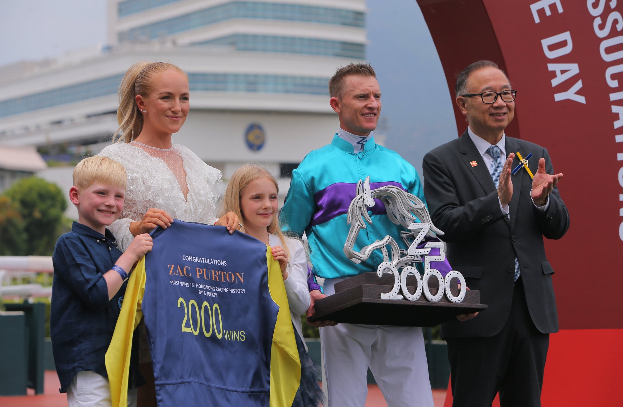 Jockey Zac Purton celebrates his 2,000th Hong Kong victory with his family. Photos: Kenneth Chan Jockey Zac Purton celebrates his 2,000th Hong Kong victory with his family. Photos: Kenneth Chan
