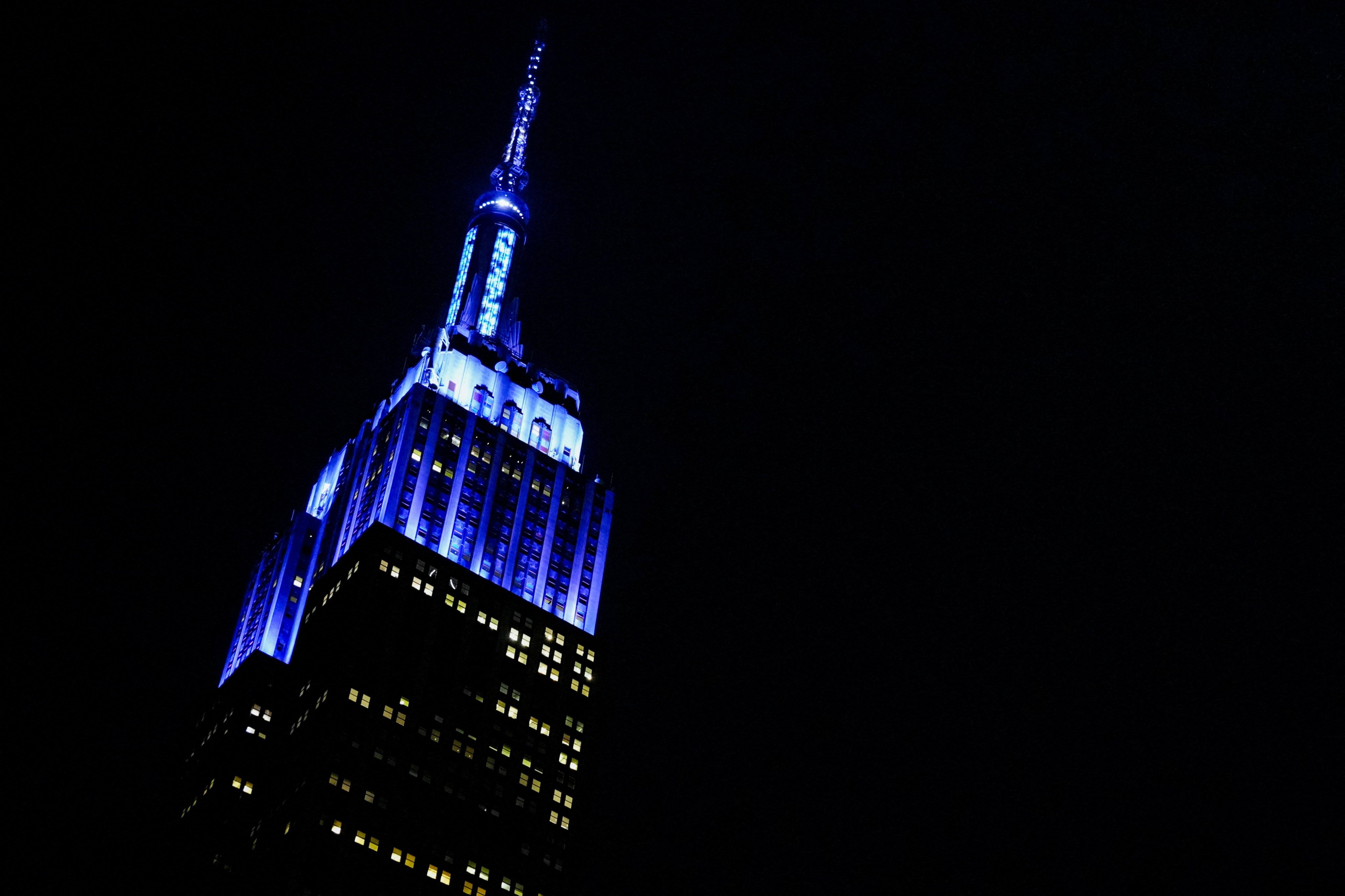 The Empire State Building is illuminated blue to mark the wedding of singer Taylor Swift and National Football League player Travis Kelce, in New York on Friday. Photo: Reuters