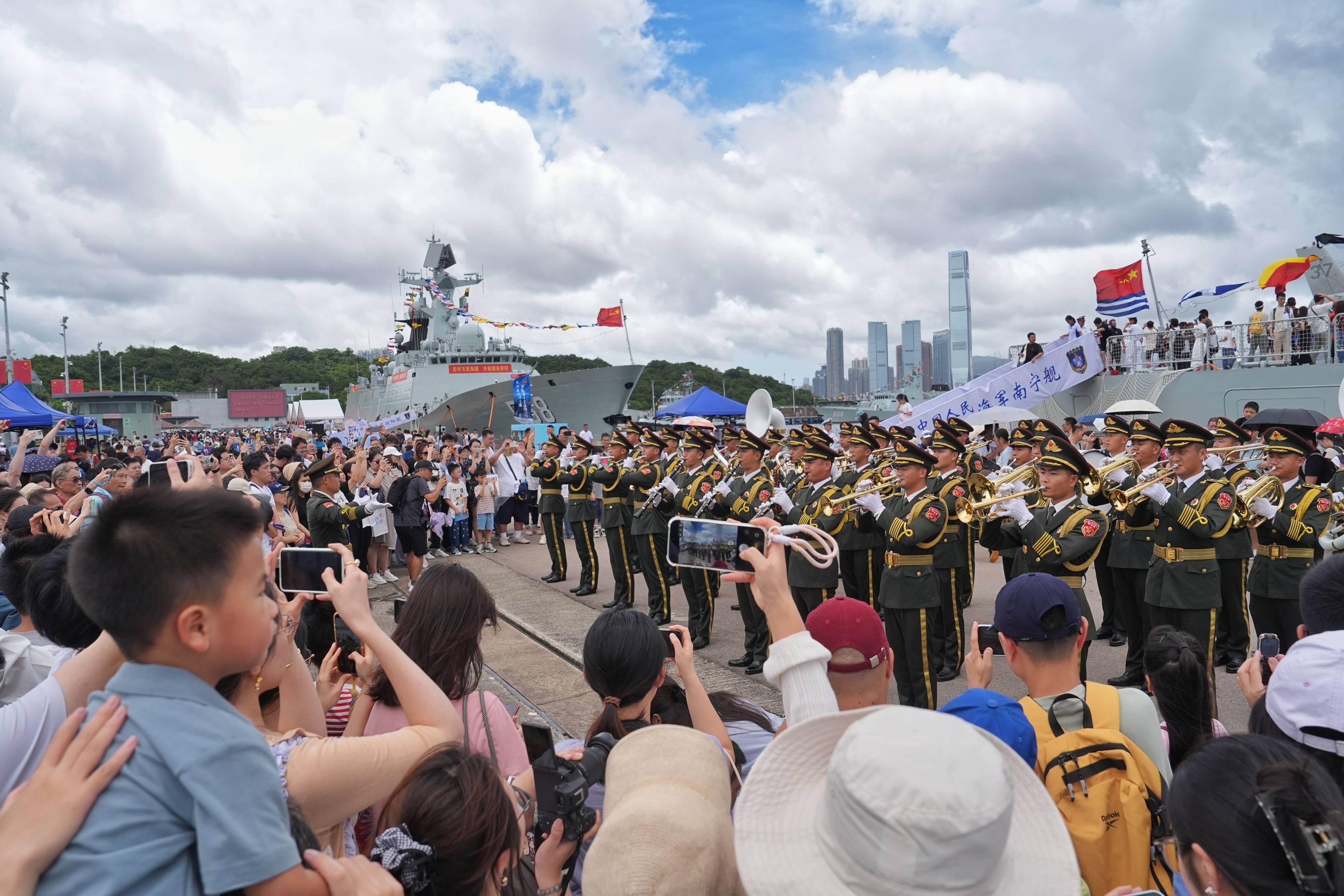 Visitors at the Ngong Shuen Chau Barracks get a closer look at the PLA Navy ships on Saturday.  Photo: Elson Li