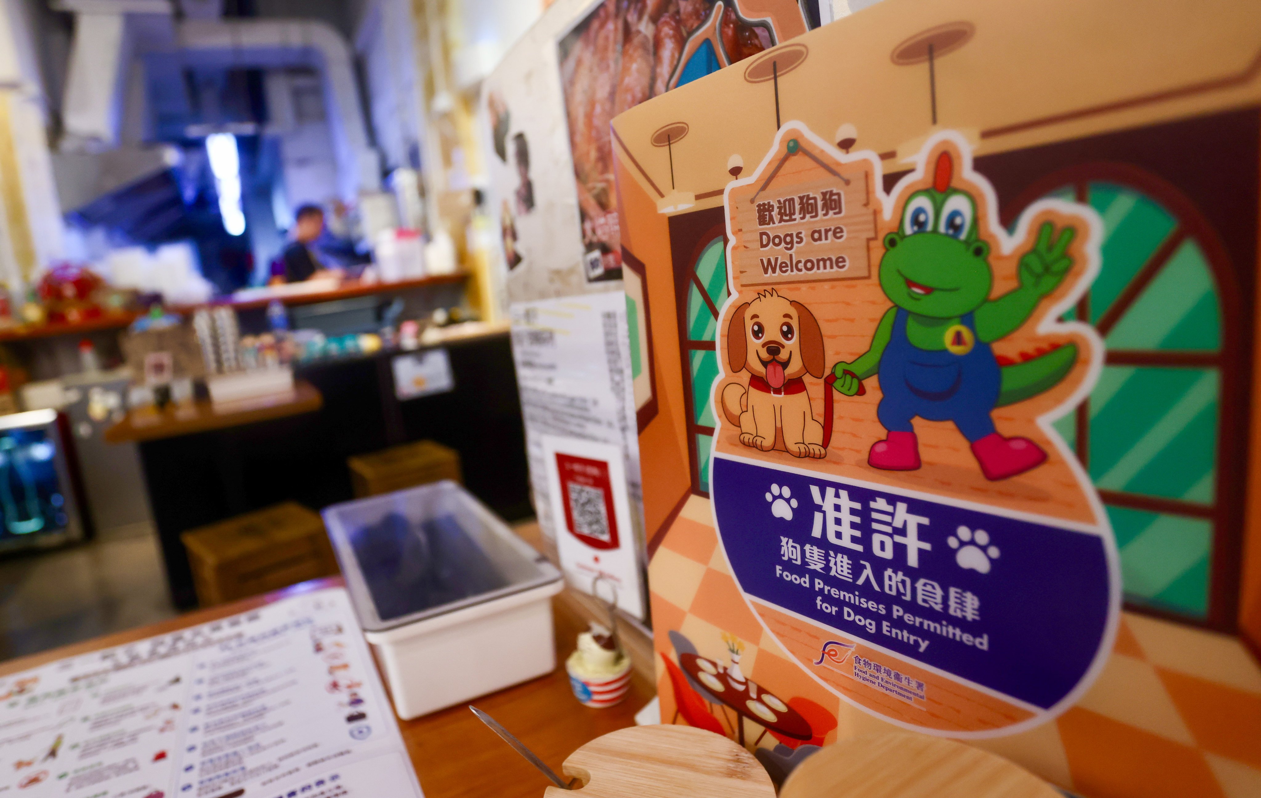 A sign at the Trinity Dumpling Bar in Mong Kok informing people of its licence. Photo: Jonathan Wong